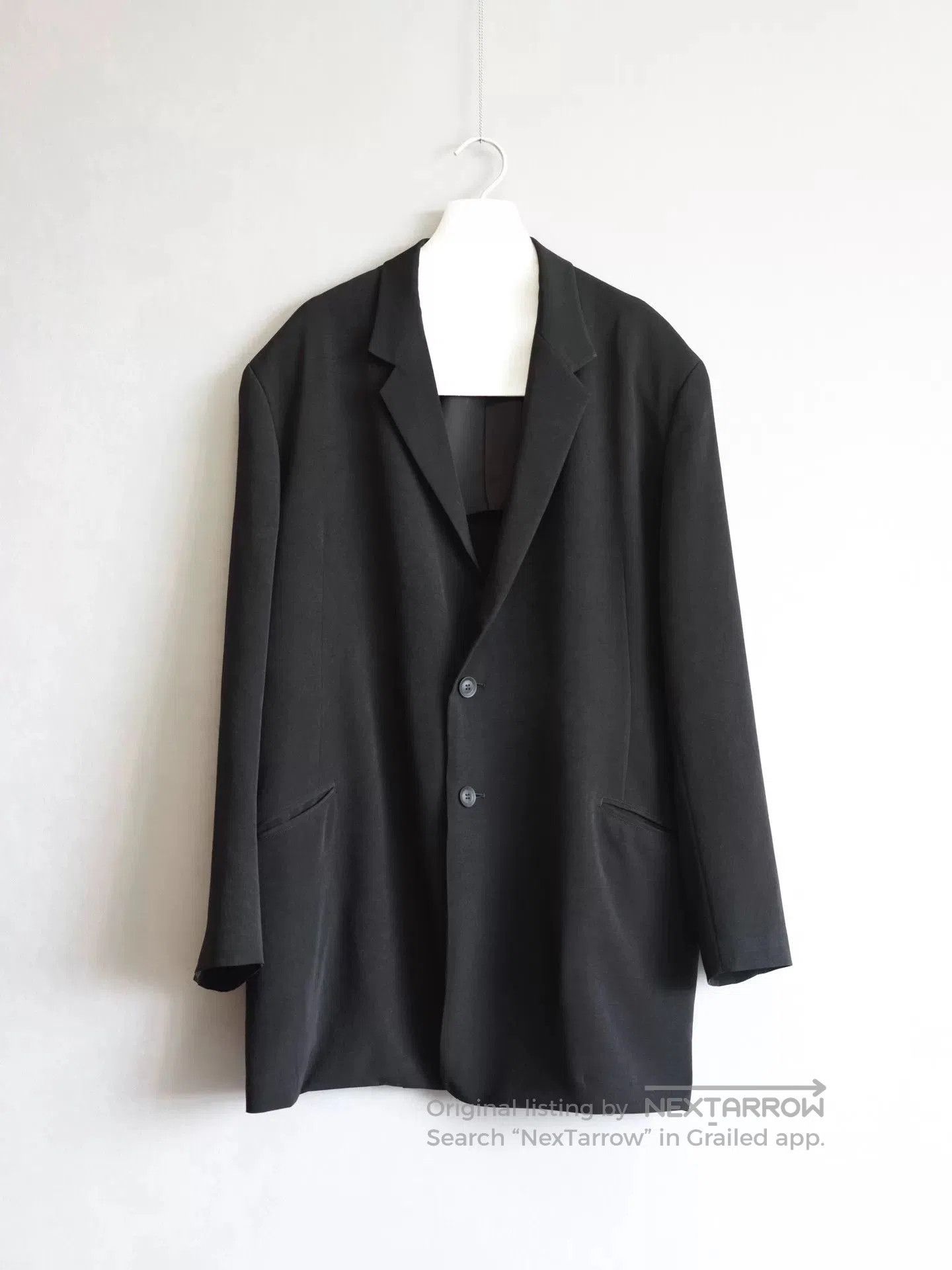 black long coat by yohji yamamoto.