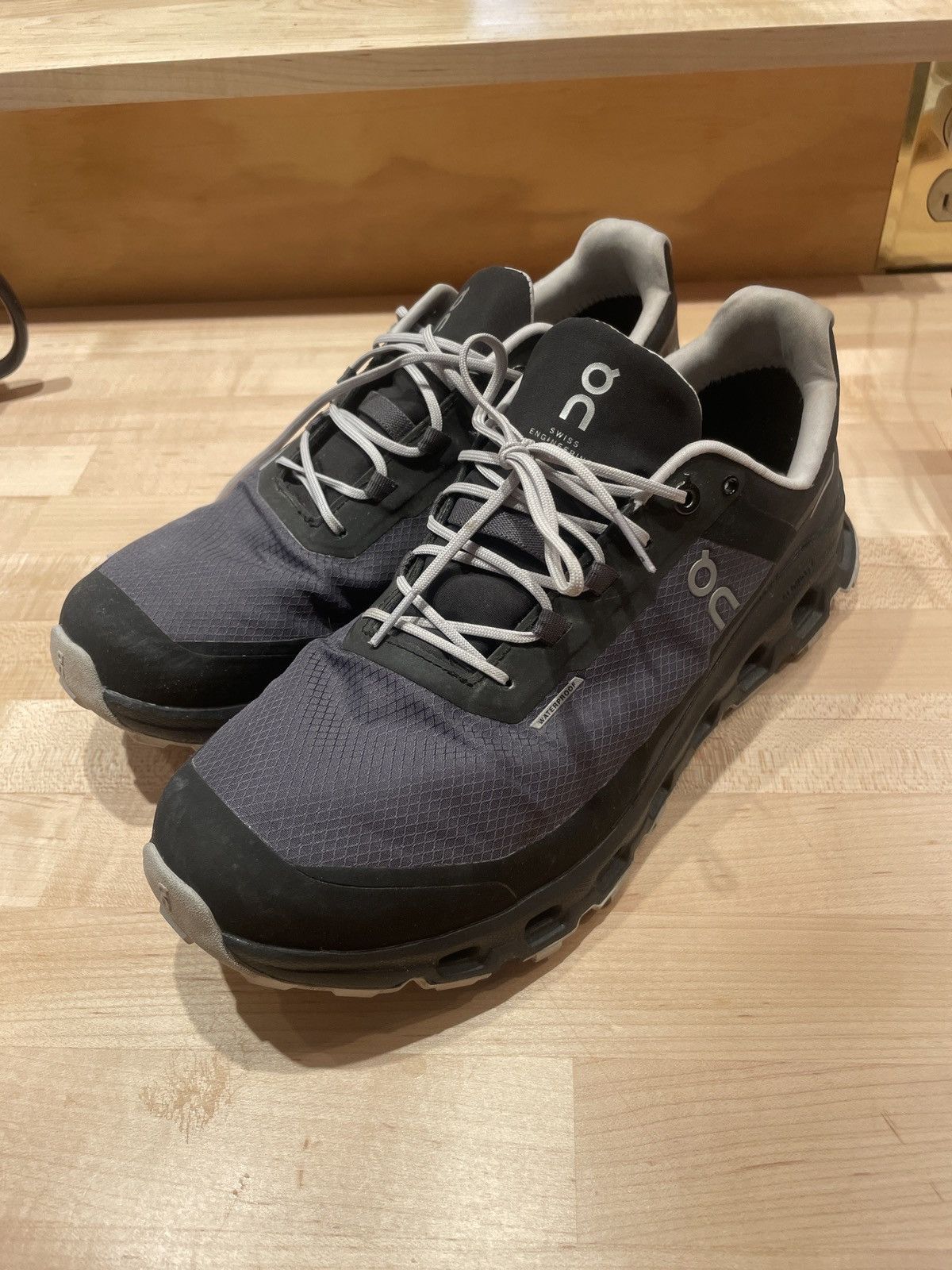On cloud waterproof trail running shoes