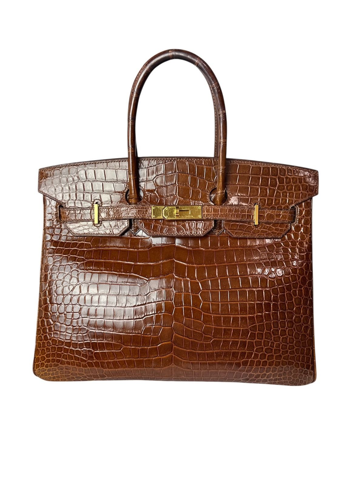 The Hermes Birkin 35 Miel shiny Porosus Crocodile GHW