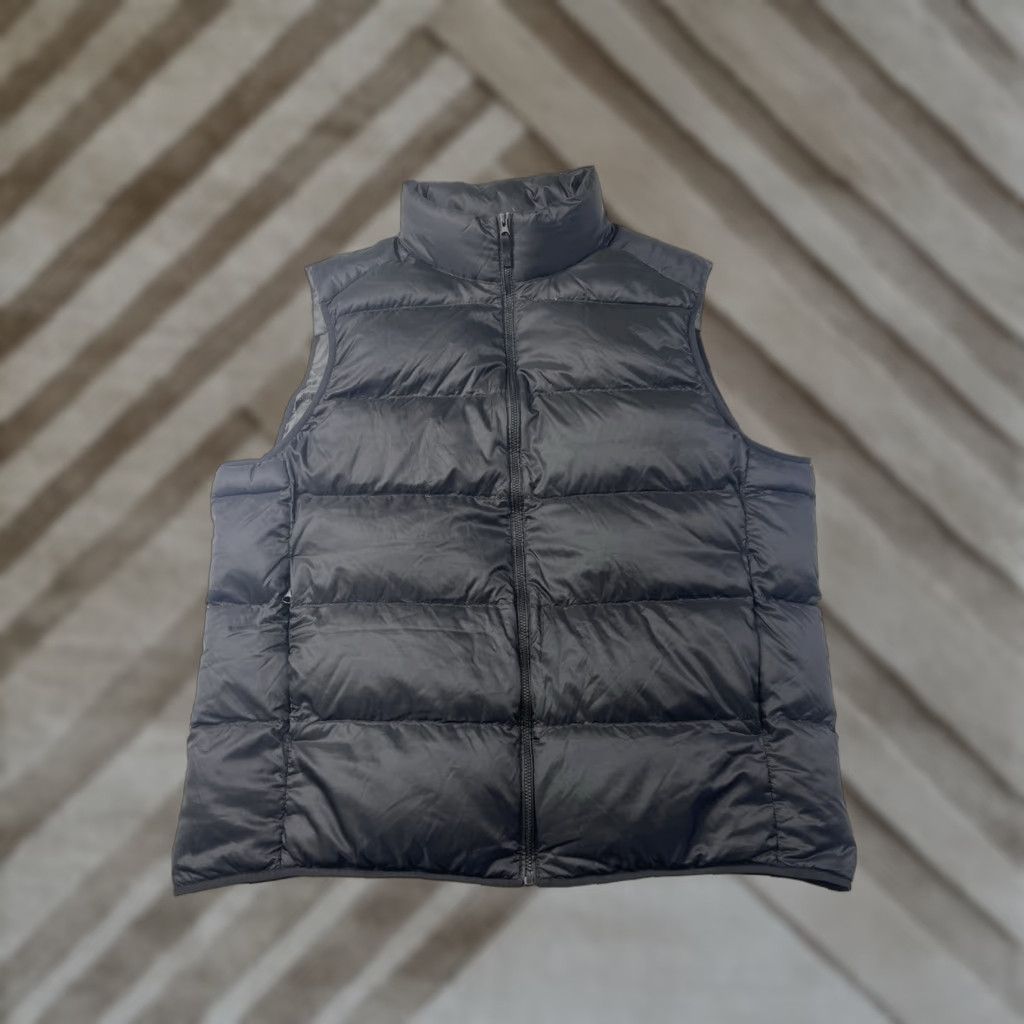 Uniqlo **Uniqlo Men's Black XL Puffer Vest** User: **Uniqlo Men's Black Ultra Light Down XL Puffer Vest** Size US XL / EU 56 / 4 - 1 Thumbnail