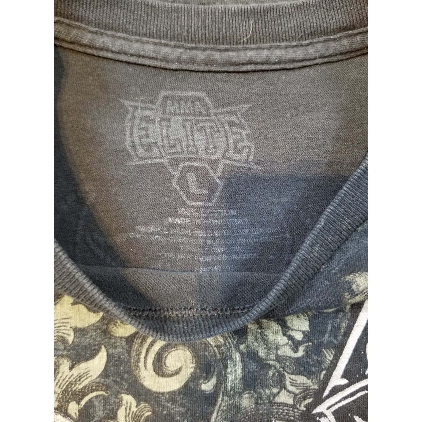 Vintage VINTAGE MMA ELITE CROSS WINGS GRUNGE MEN'S T-SHIRT SZ LARGE - BLACK, CAMOUFLAGE, SHORT SLEEVE, ROUND NECK, USA THEME, REGULAR FIT, MEN, T-Shirt Size US L / EU 52-54 / 3 - 4 Thumbnail