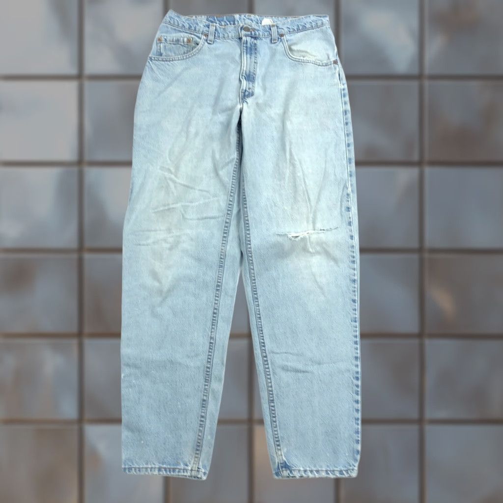 Levi's VINTAGE Levi's 560 Jeans Mens 32x33 Light Wash 90s Distress Tapered Blue Jeans Distressed Mens 90s Size US 32 / EU 48 - 1 Thumbnail