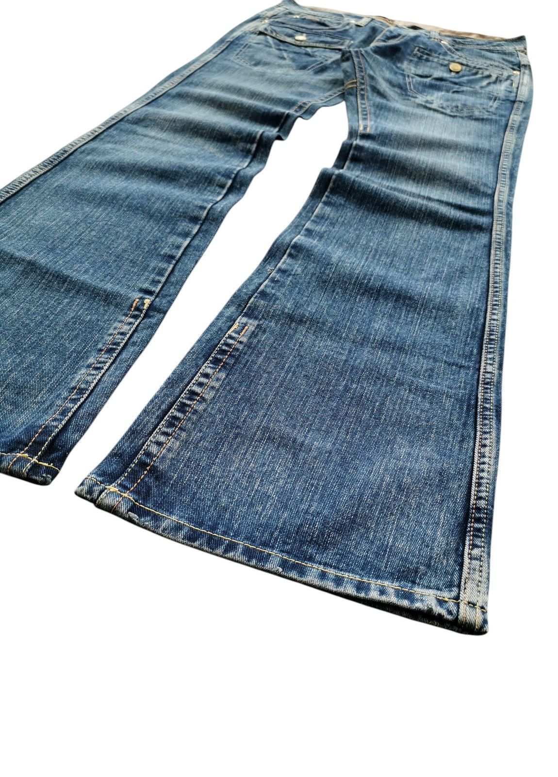 犬畜生5351 pour les hommes flare denim 5351 Pour Les Hommes Early 2000's Acid-Wash Waxed Flared