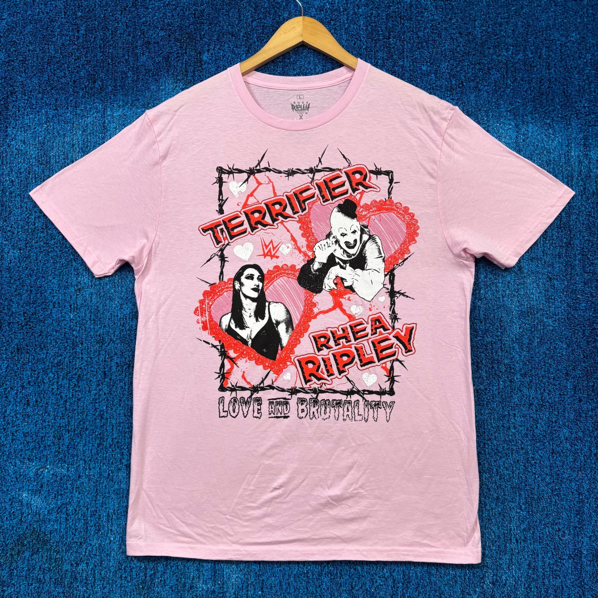 WWE Rhea Ripley x Terrifier Art the Clown Love & Brutality Tee L | Grailed