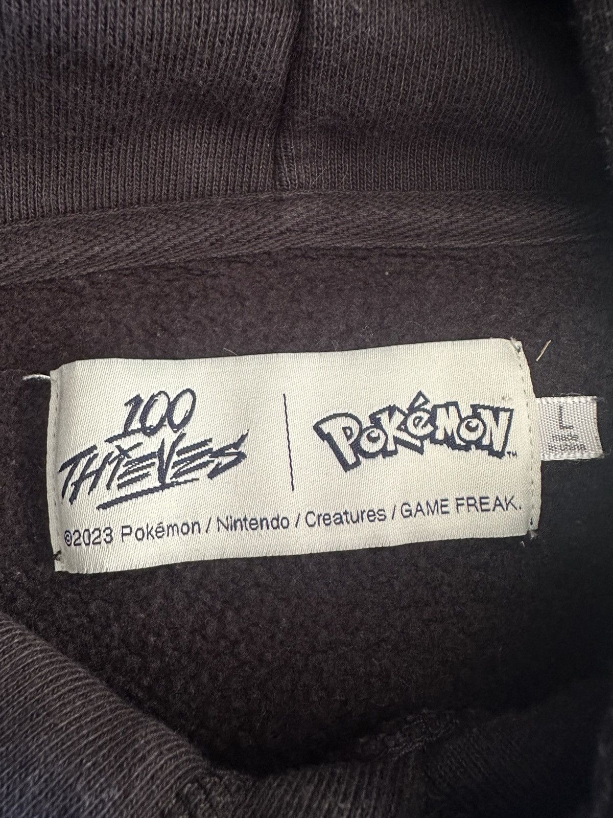 100 Thieves 100 Thieves x Pokémon Hoodie — Gengar (L) Size US L / EU 52-54 / 3 - 5 Thumbnail
