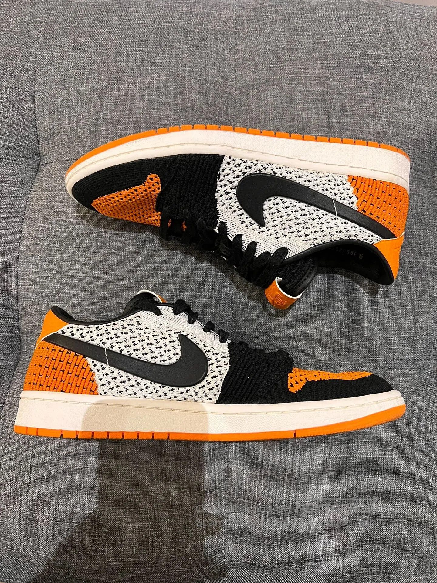 Jordan Brand aj1 low flyknit black orange sneakers. Size US 9.5 / EU 42-43 - 5 Thumbnail