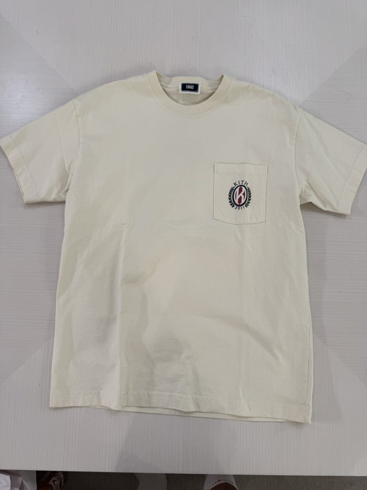 Kith Kith K shield pocket tee sandrift size XS used spring 2025 Size US XS / EU 42 / 0 - 3 Thumbnail
