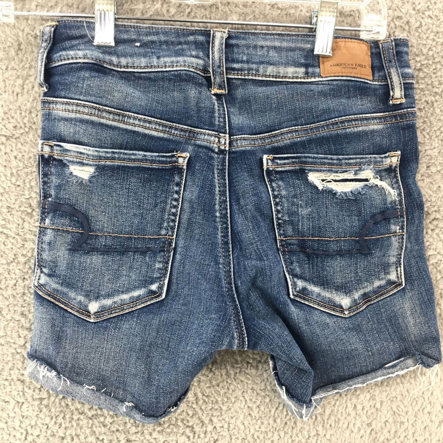 American Eagle Outfitters American Eagle Outfitters Next Level Stretch Distressed Cut Off Short Womens 2 Blue Denim Color Blue 5-Pocket Design Regular Juniors? Size 26" / US 2 / IT 38 - 7 Thumbnail
