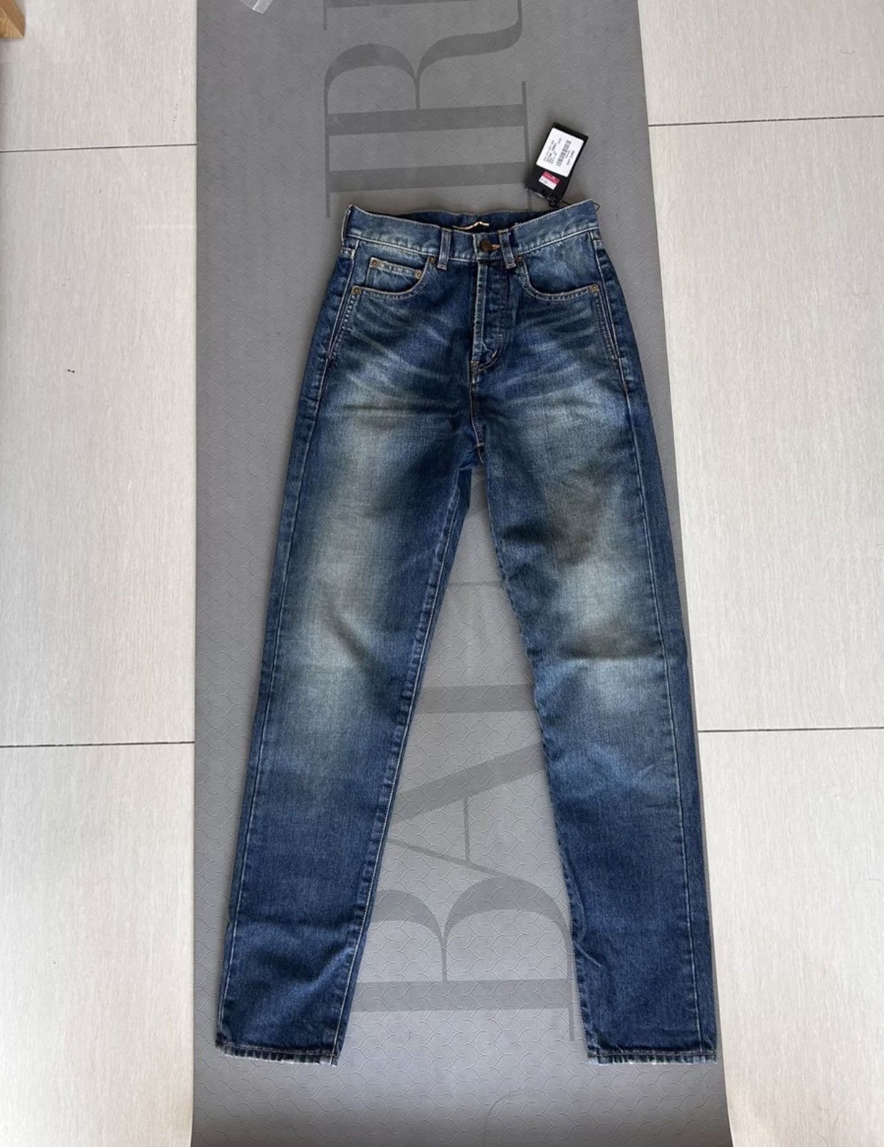 image of Saint Laurent Paris x YVES Saint Laurent Jeans in Blue, Women's (Size 24)