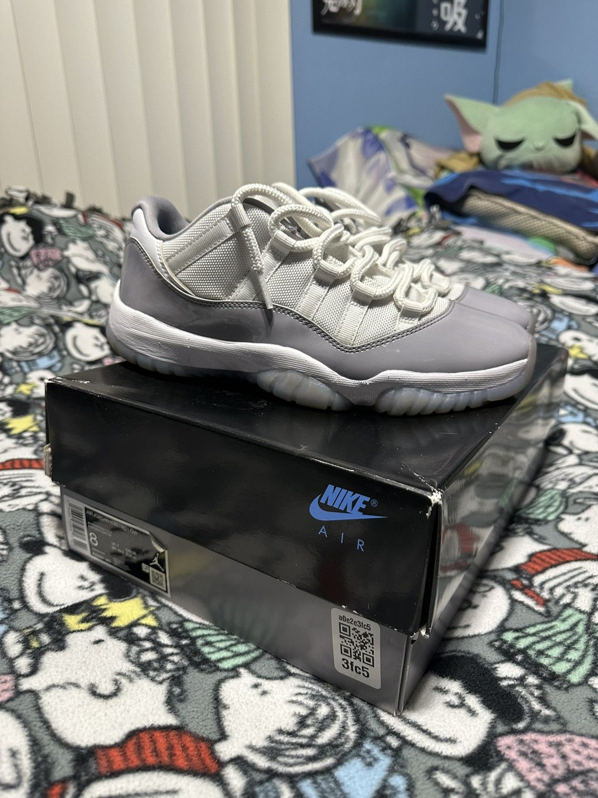 Air Jordan 11 Retro Low Cement Grey