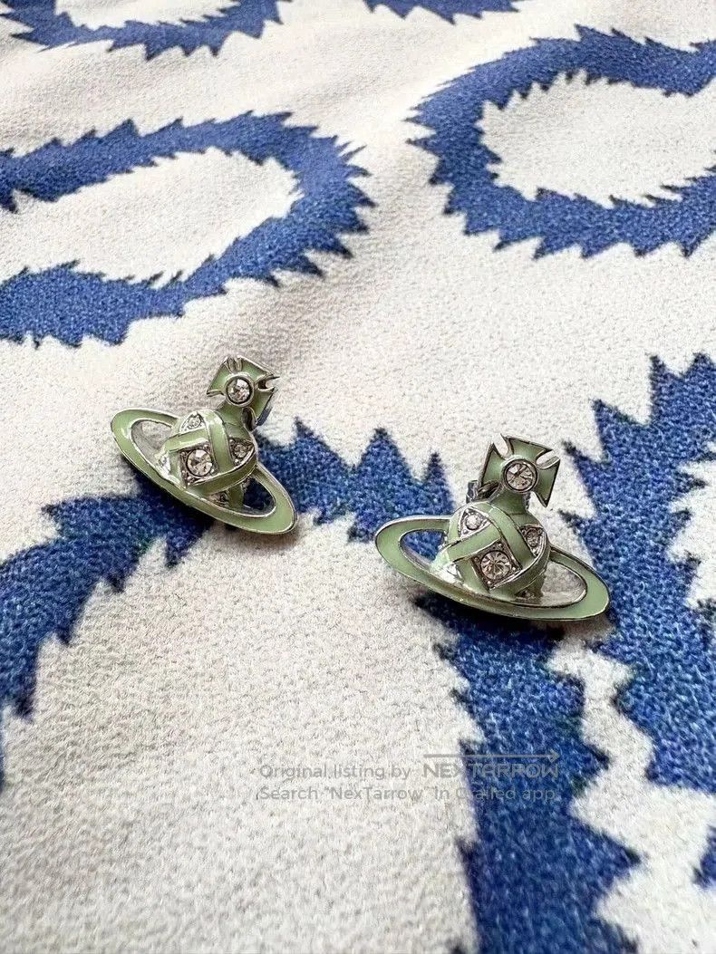 Vivienne Westwood Green Saturn Earrings.