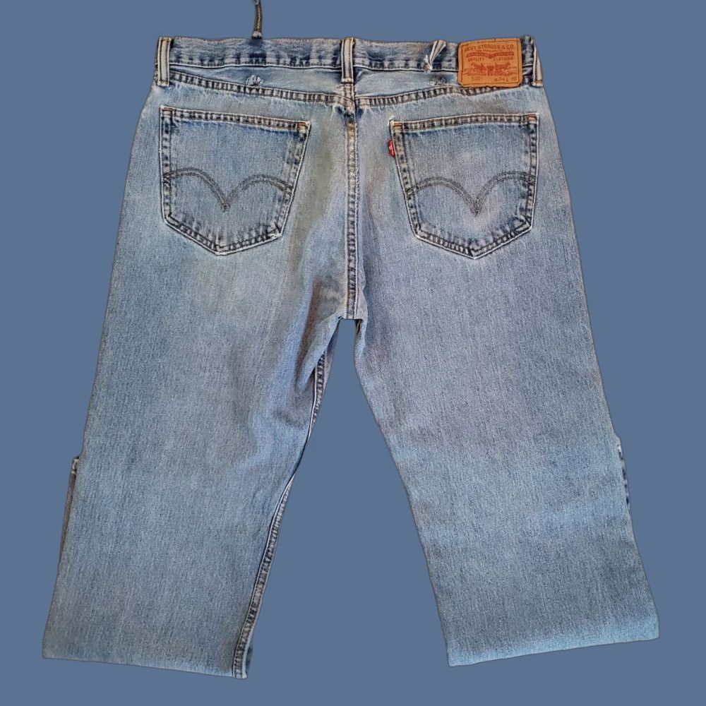 Levi's VINTAGE Levi's 505 Jeans Mens 38x30 Blue Straight Leg Distressed Hole Ripped Denim 5-Pocket Regular Zip Fly Belt Loops Men Jeans Size US 38 / EU 54 - 1 Thumbnail
