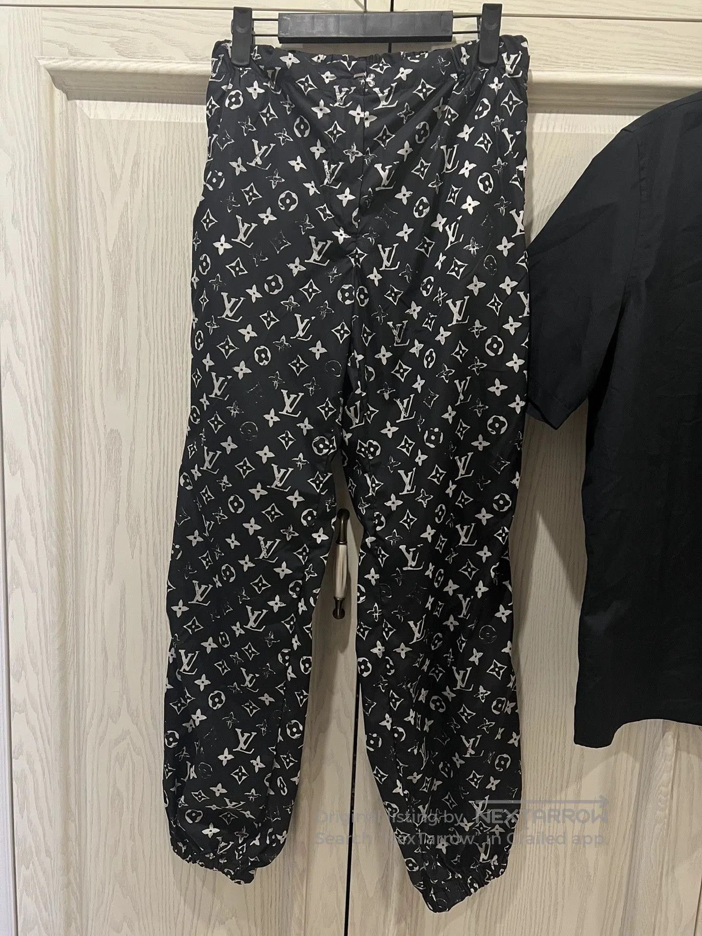 Louis Vuitton black logo print sweatpants from louis vuitton. Size 35" - 1 Thumbnail