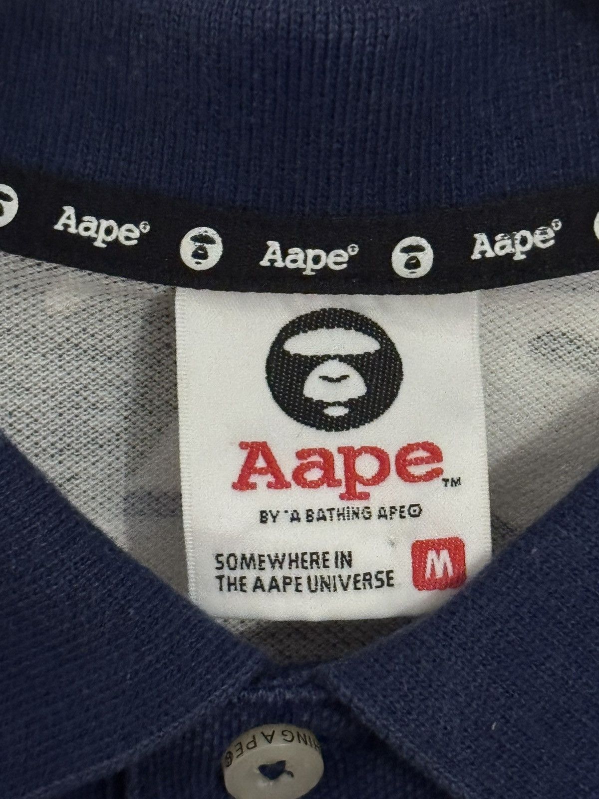 Aape polo shirt is from the brand AAPE BY A BATHING APE. Size US M / EU 48-50 / 2 - 10 Thumbnail