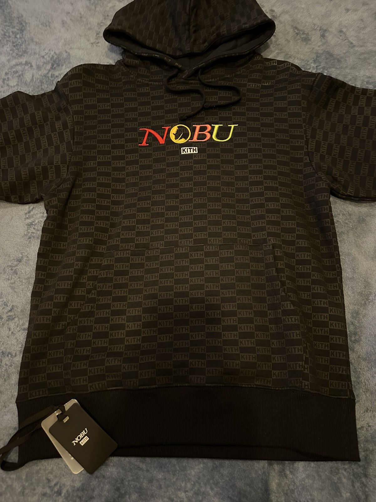 image of Kith X Nobu Multi Logo Hoodie in Black, Men's (Size XS)