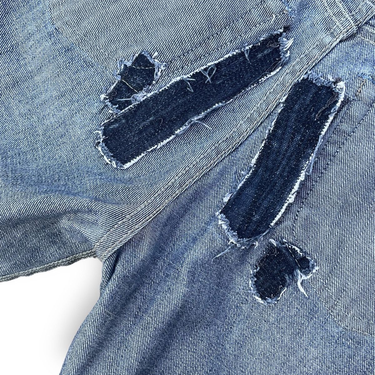 VINTAGE Y2K EVISU X PUMA DISTRESSED WASHED DENIM PANTS