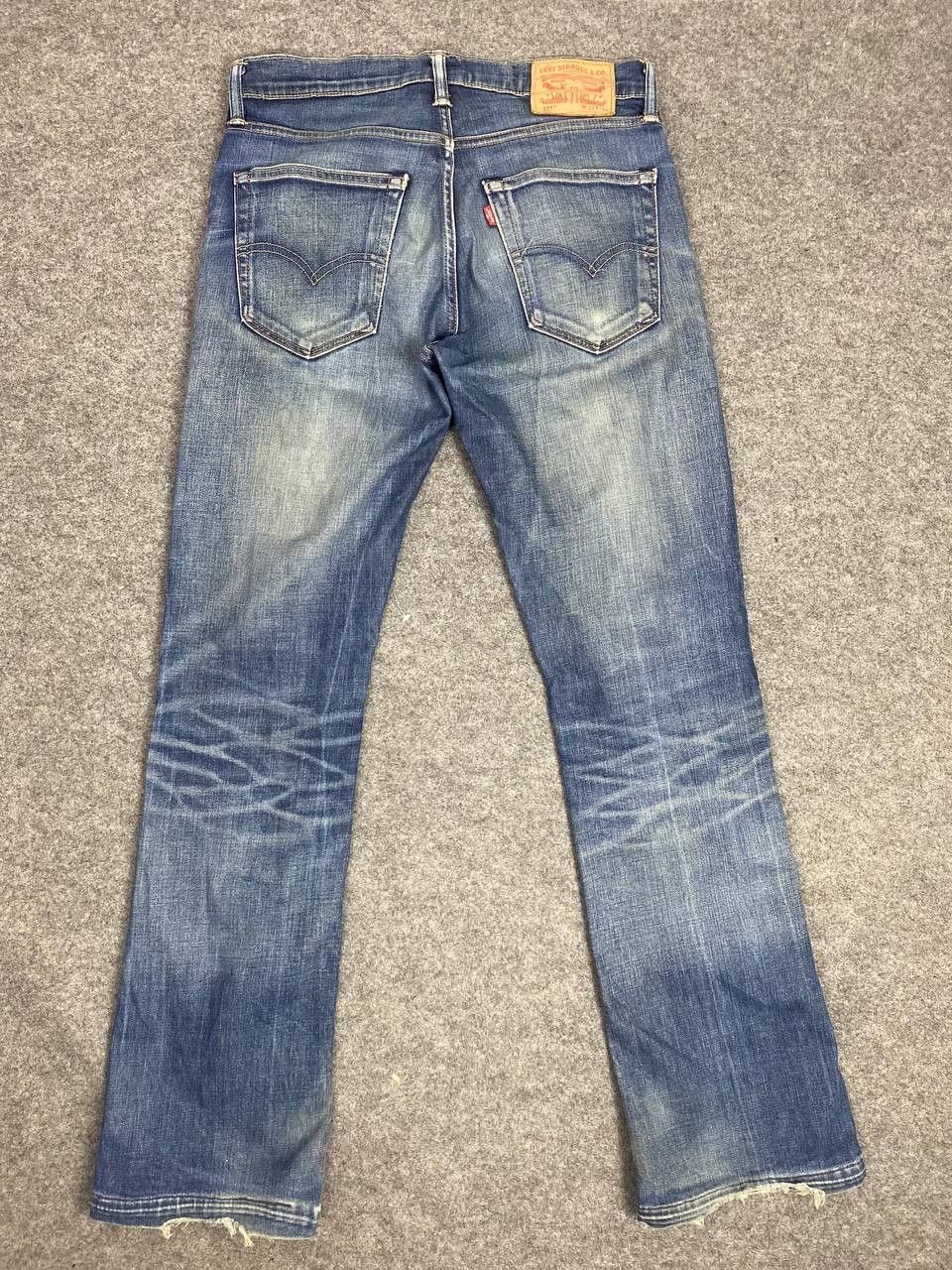levis 527 bootcut flare distressed denim