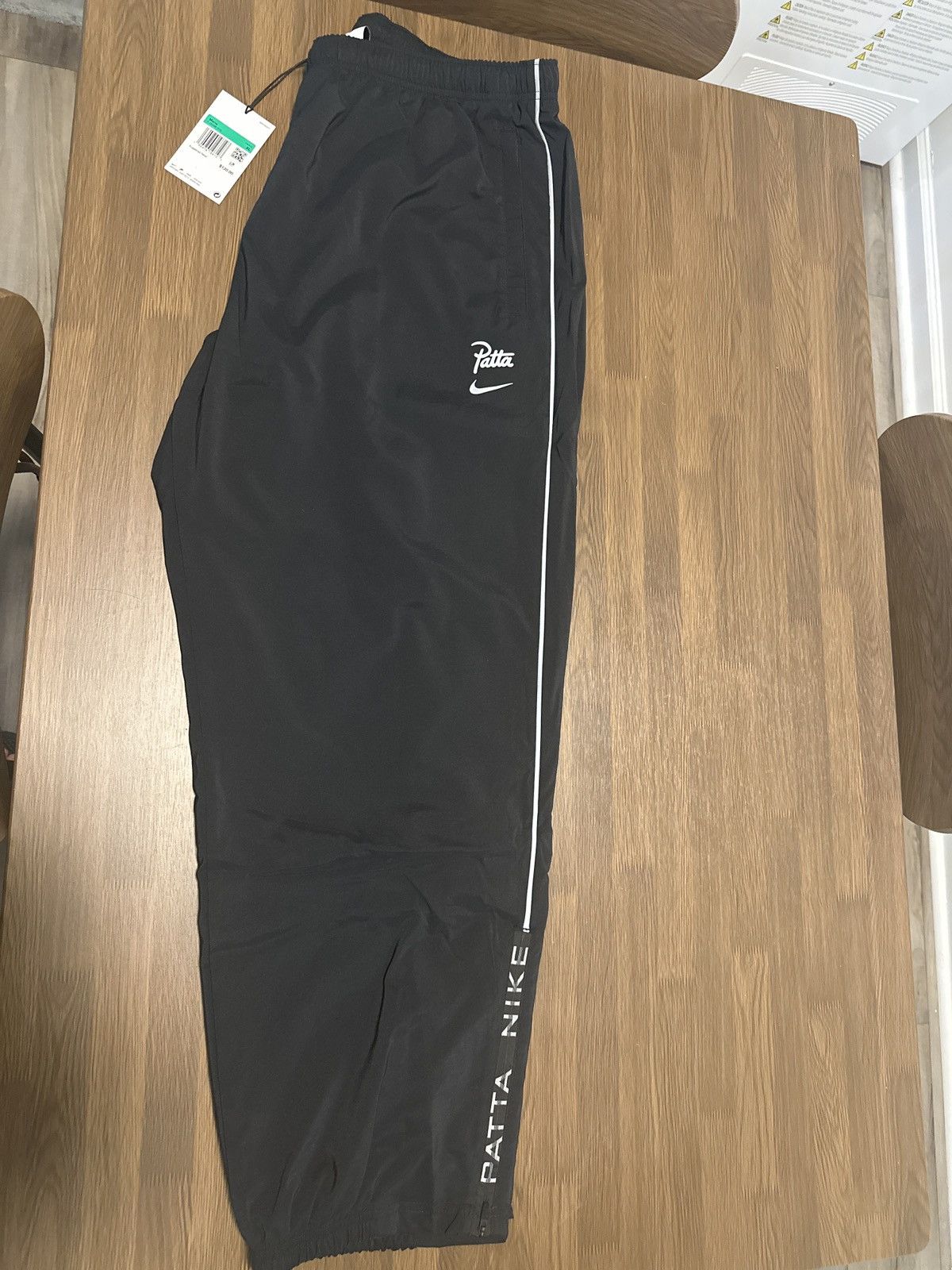 image of Nike x Patta Running Team Men’S Track Pants in Black, Men's (Size 36)