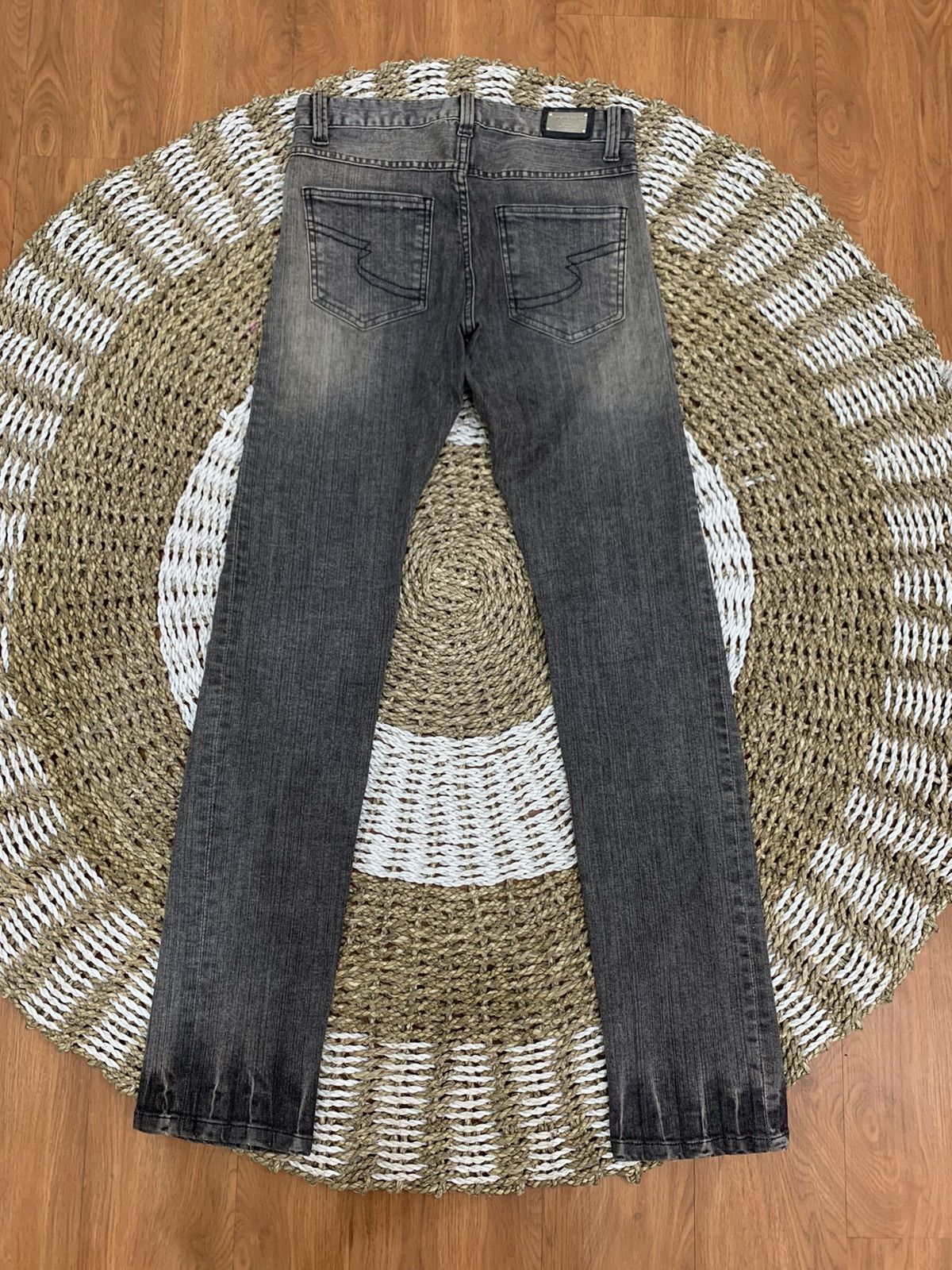 Semantic design studded distressed jeans Menswear