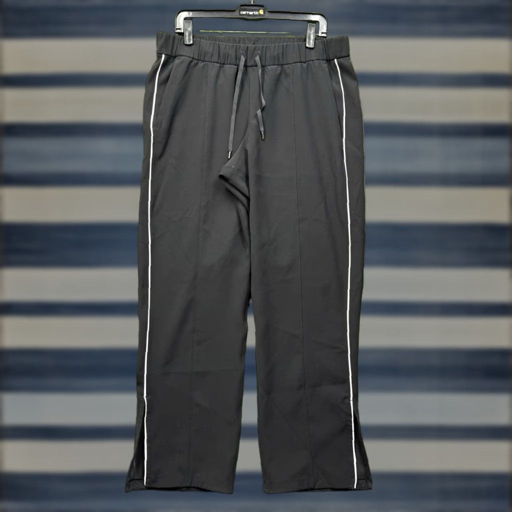 Lululemon Lululemon Track Pants Womens 12 Black On The Right Split Hem Relaxed Fit Gym Size 34" / US 12 / IT 48 - 1 Thumbnail