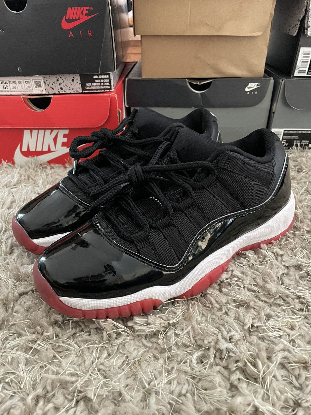 Jordan Brand Jordan 11 Bred Low Size US 7 / EU 40 - 1 Thumbnail