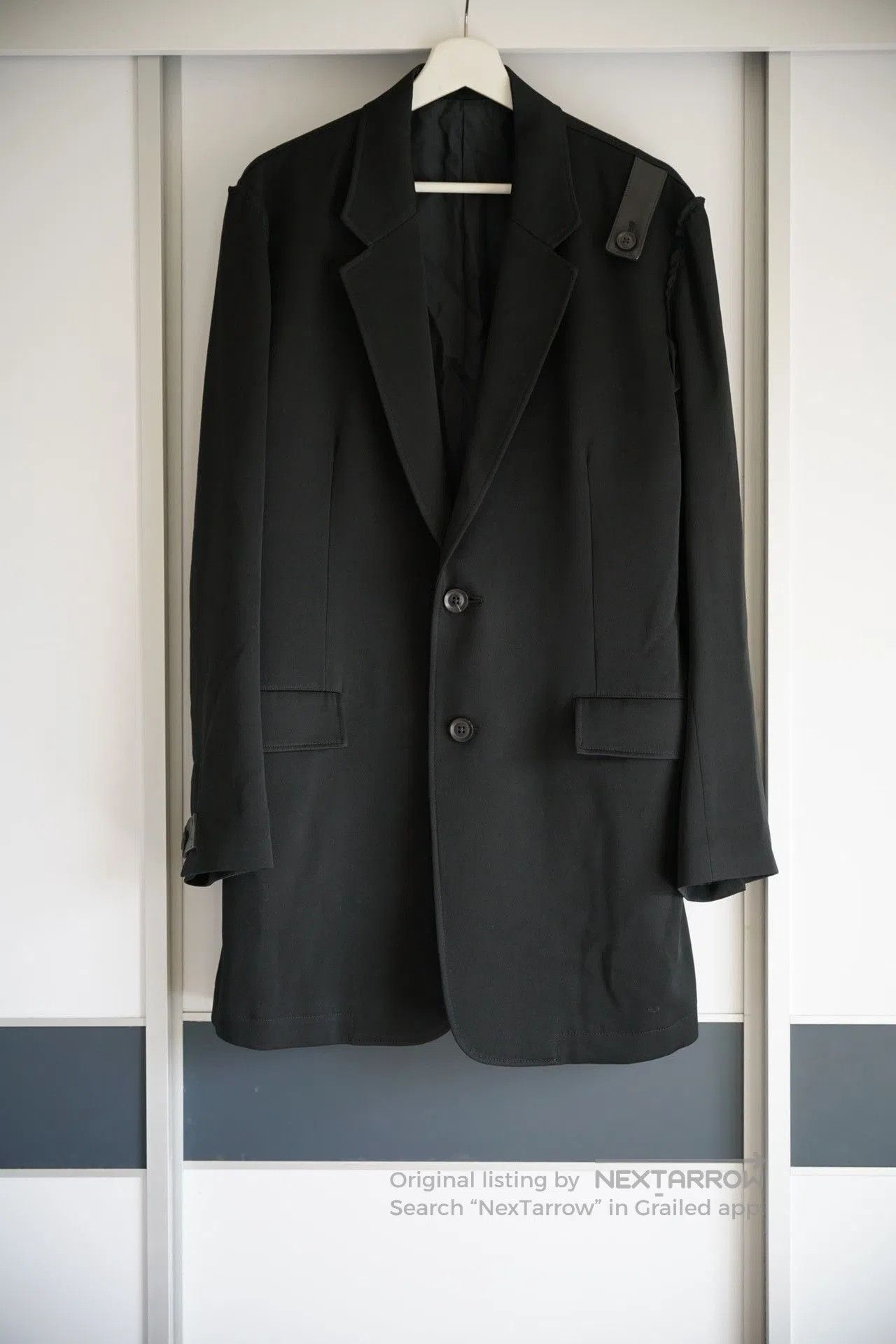 yamamoto black suit jacket with pleats.