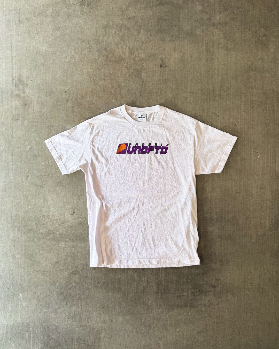 Undefeated Undefeated PHX Suns logo Size US L / EU 52-54 / 3 - 1 Thumbnail