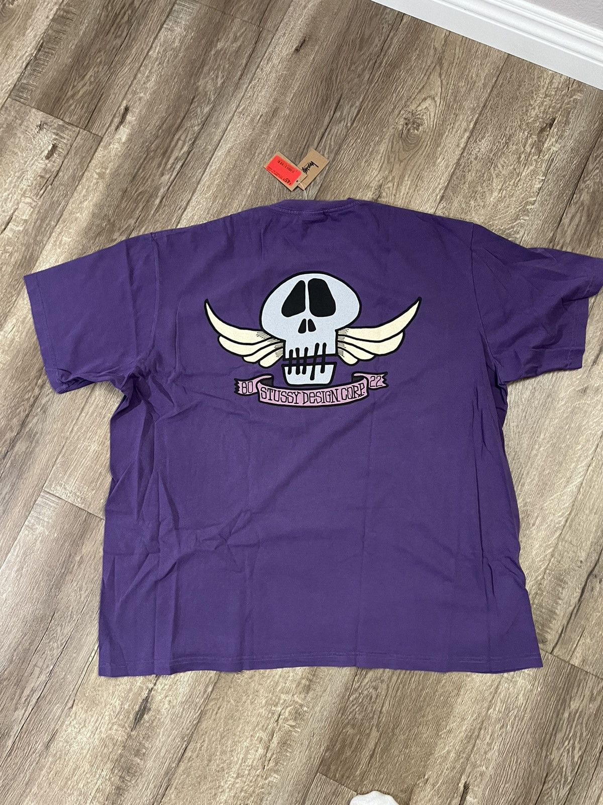 Stussy STUSSY AUSTRALIA SKULL WINGS PIGMENT DYED TEE | Grailed