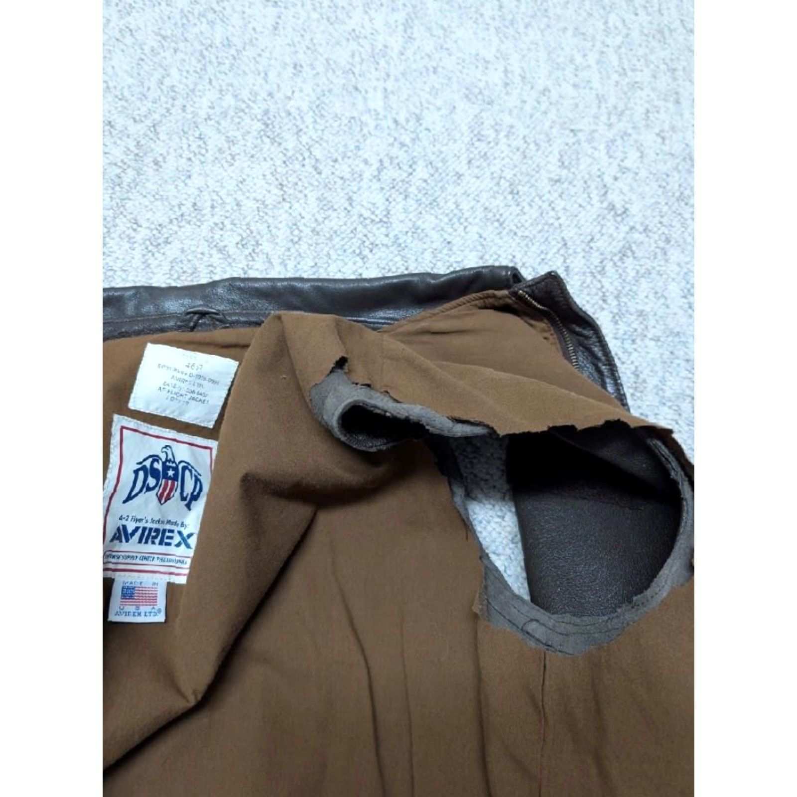 Avirex VINTAGE Avirex leather vest A2 bomber 46 brown XL cut-off sleeves Men's size XL brown leather vest USA made A2 bomber vest Mens XL brown 90s event Size US XL / EU 56 / 4 - 7 Thumbnail