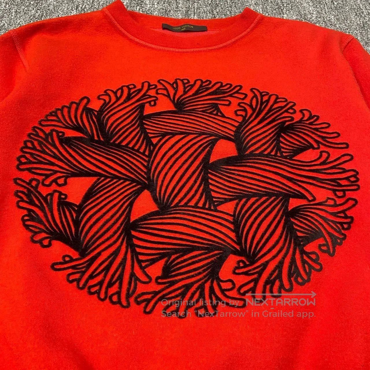 red limited edition knit sweatshirt.