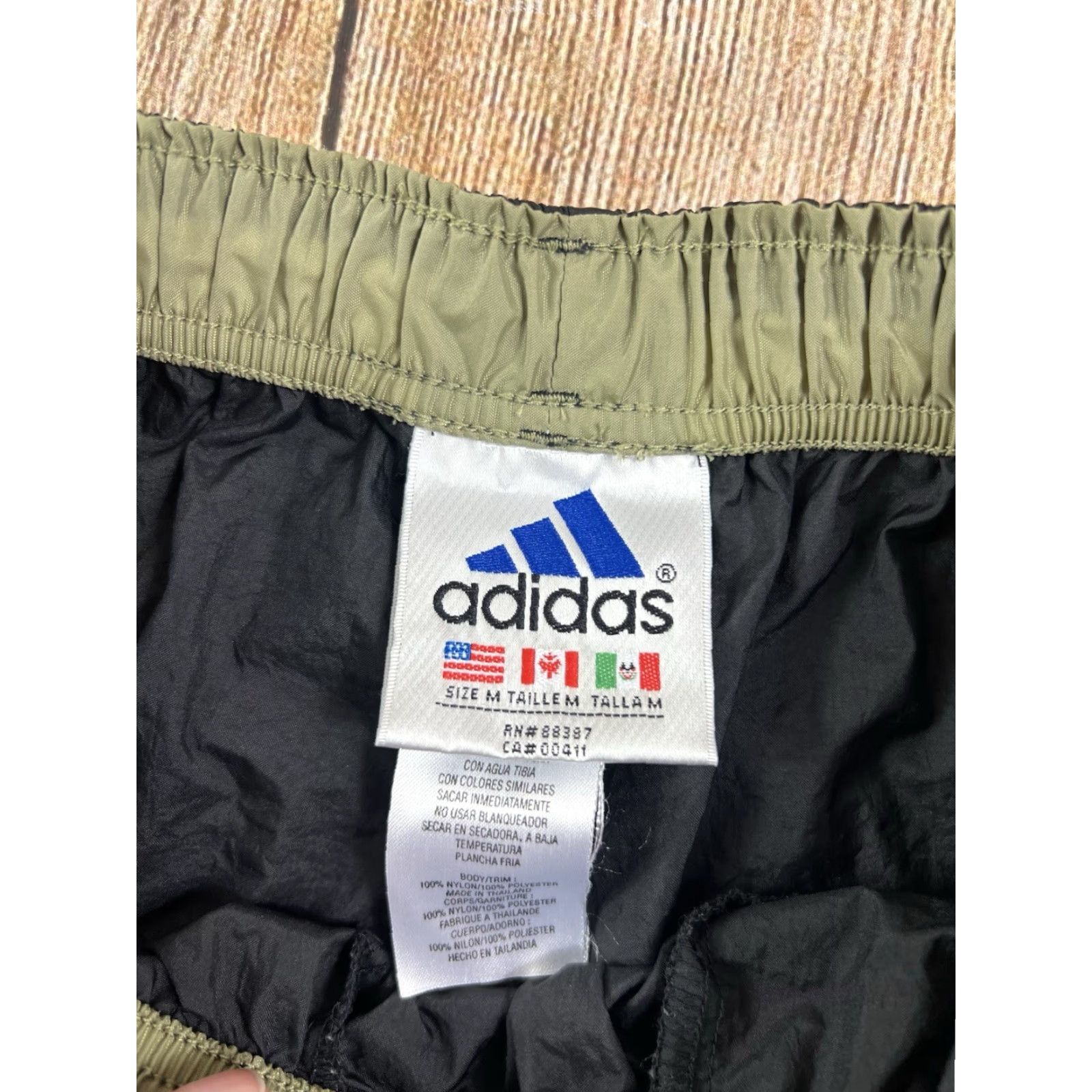 Adidas VINTAGE Adidas Nylon Track Pants Black Olive Green Mens M Ankle Zips Pockets Elastic Waist Regular Size Medium Sports Activewear Pants Size US 31 - 7 Thumbnail