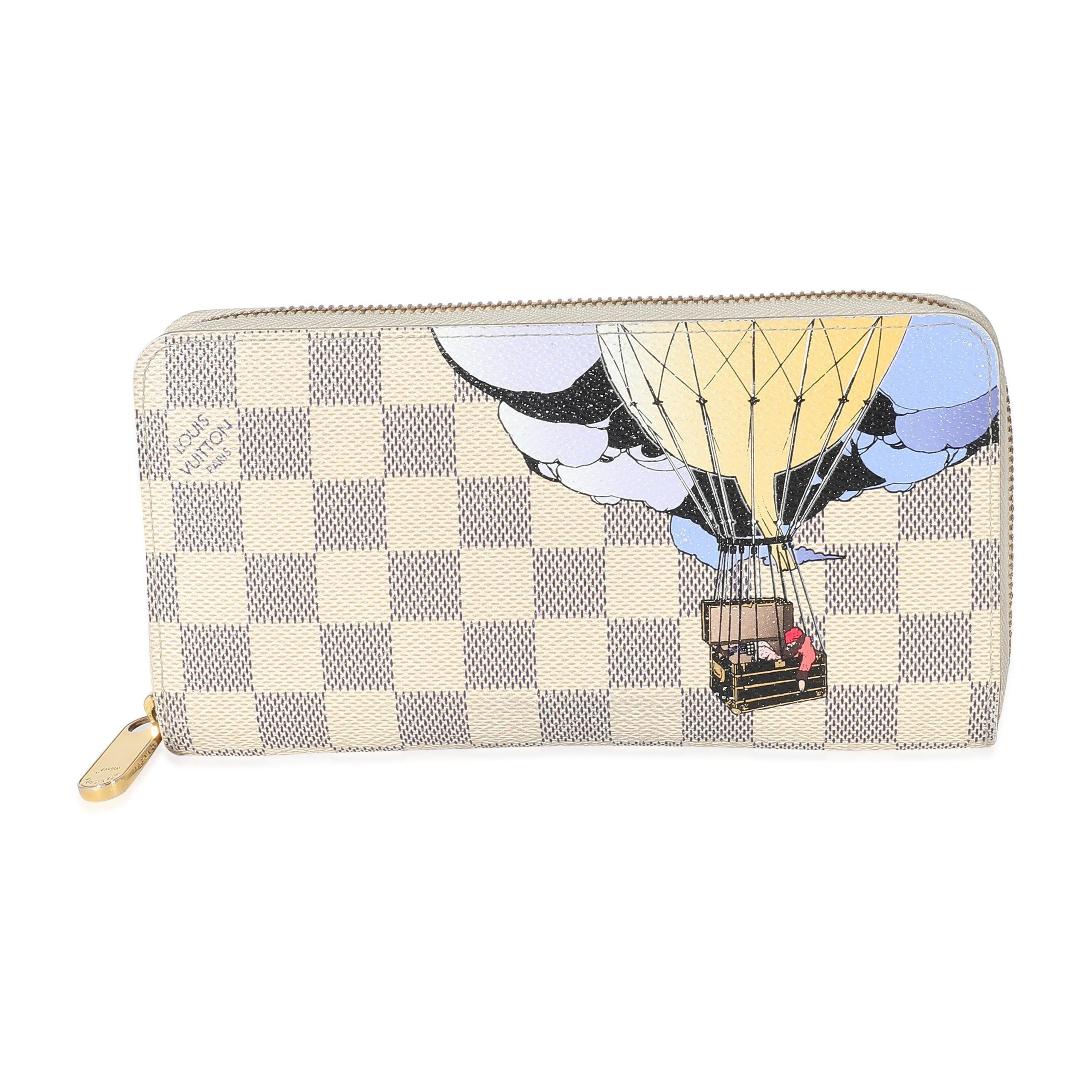 image of Louis Vuitton Damier Azur Canvas Illustre Zippy Wallet in White, Women's