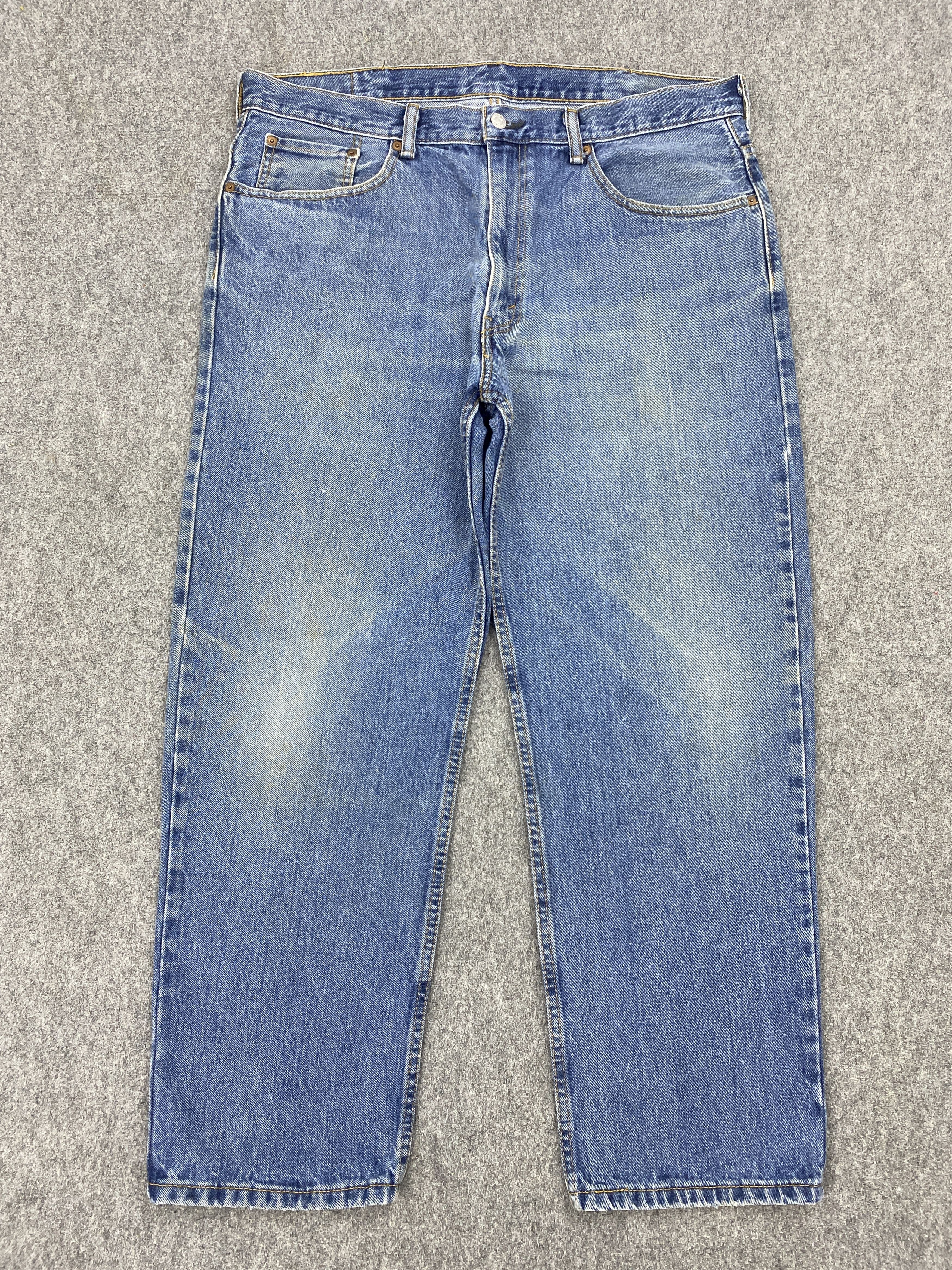 image of Faded Blue Denim Vintage Levis 550 Jeans, Men's (Size 38)