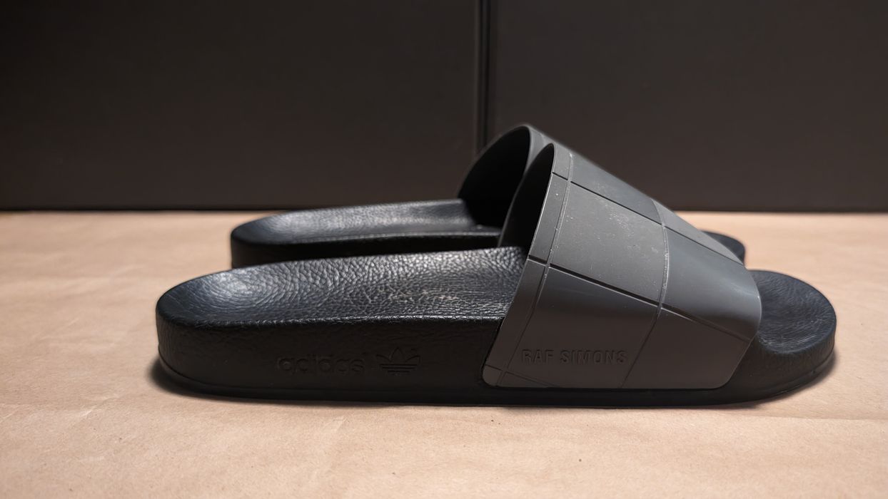 Adidas adilette raf simons hot sale