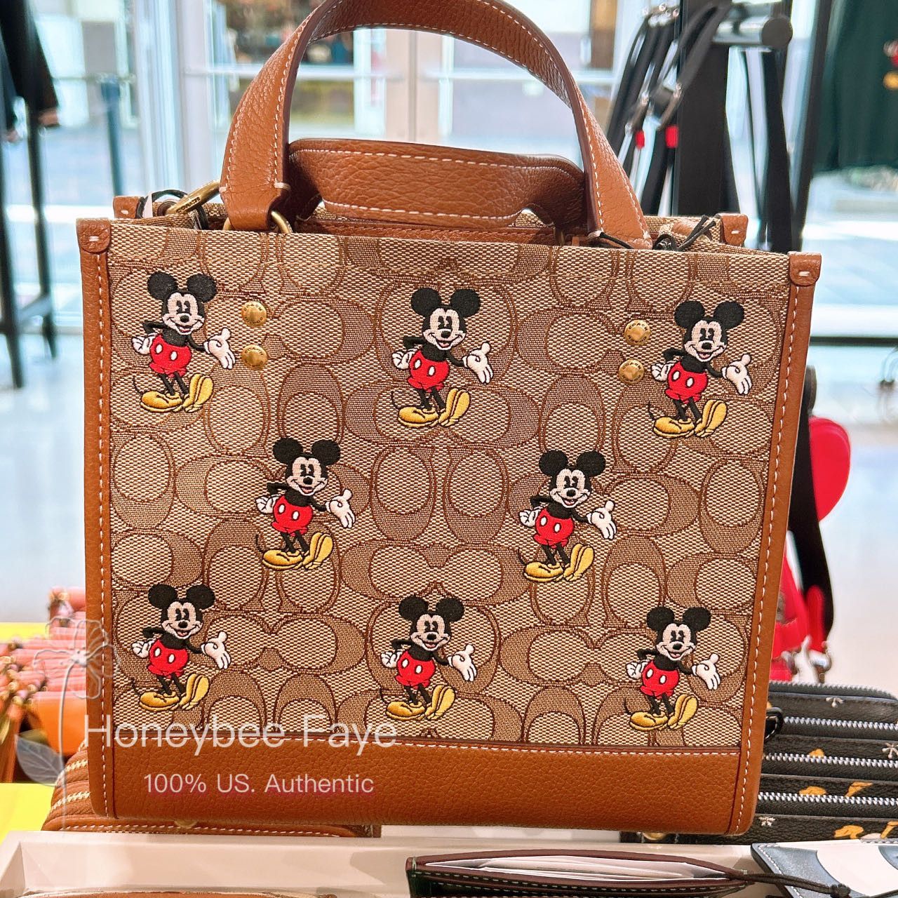 NWT DISNEY X COACH Dempsey Carryall outlets With Cruella Motif