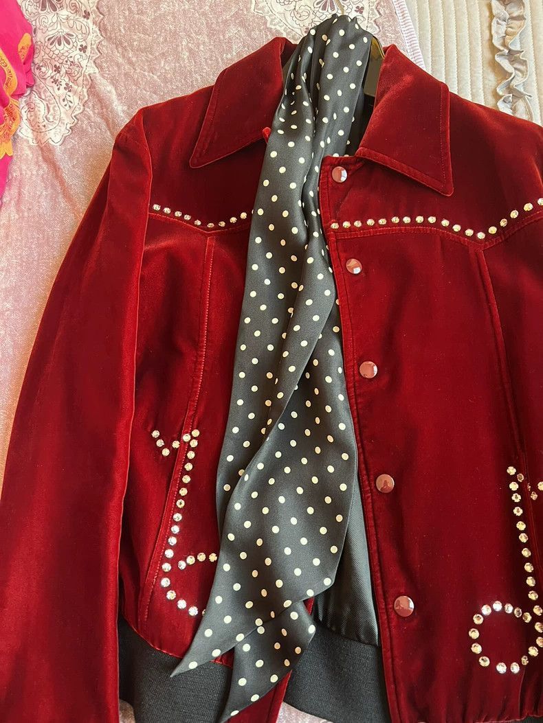 red velvet Saint Laurent jacket with studs