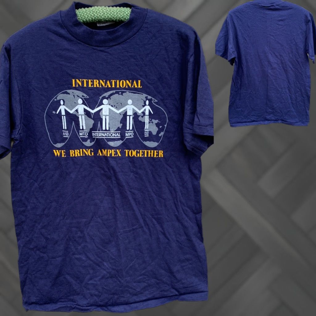 Hanes VINTAGE Hanes Maverick INTERNATIONAL MPD DSD We Bring AMPEX Together Tee Shirt M Blue Mens 1980s Graphic Tee Size ONE SIZE - 1 Thumbnail