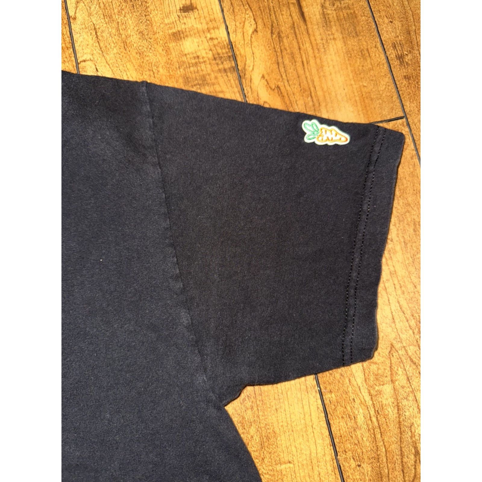 Vintage **Anwar Carrots Black Large Graphic T-Shirt** User: Anwar Carrots Black Large Graphic T-Shirt Size US L / EU 52-54 / 3 - 7 Thumbnail