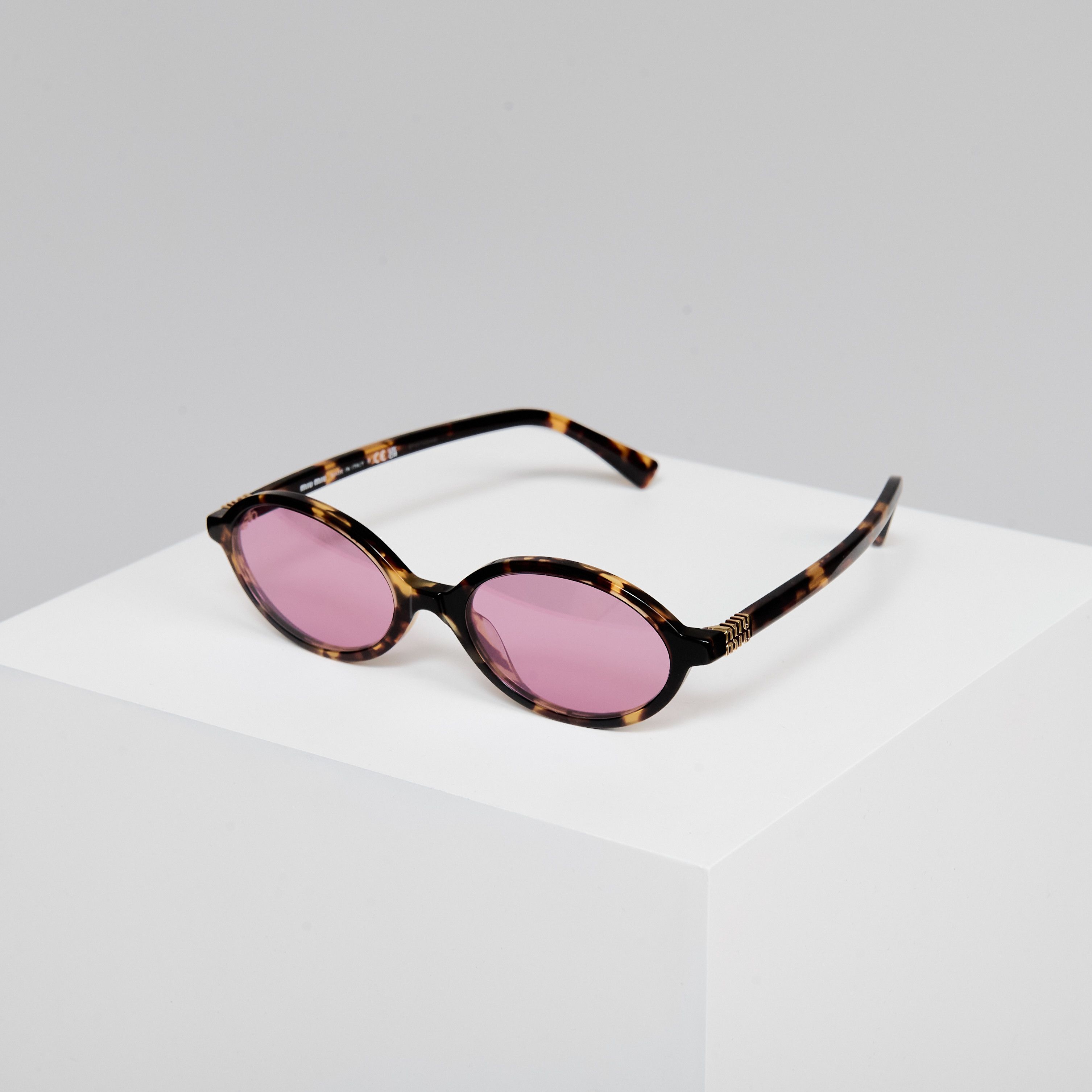 Miu Miu MIU MIU MU 04ZS VAU50D Eyewear HONEY Size ONE SIZE - 1 Thumbnail