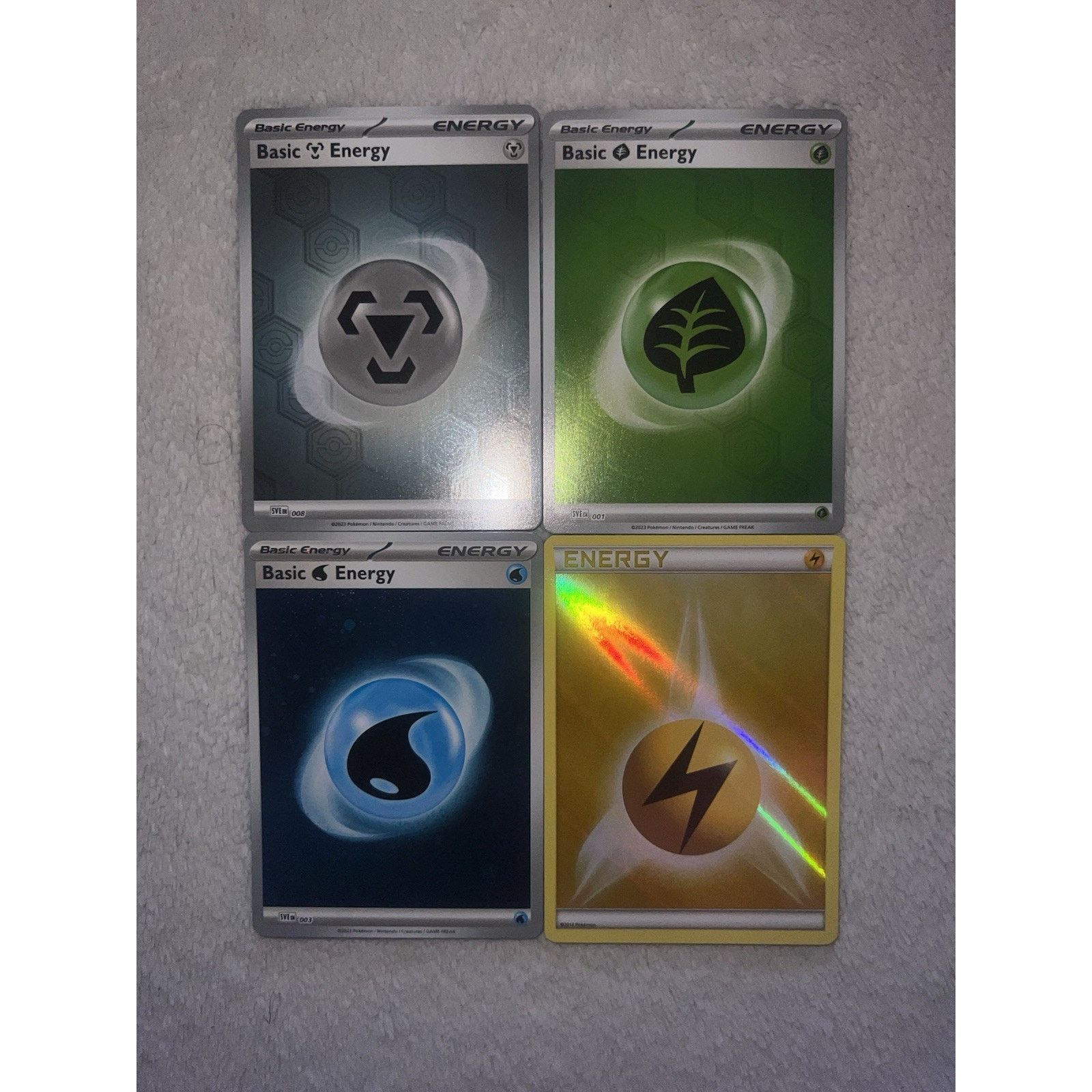 Pokemon 4 CARDS - RH Steel, Grass, Electric; CH Water Energy (NM) Size ONE SIZE - 1 Thumbnail