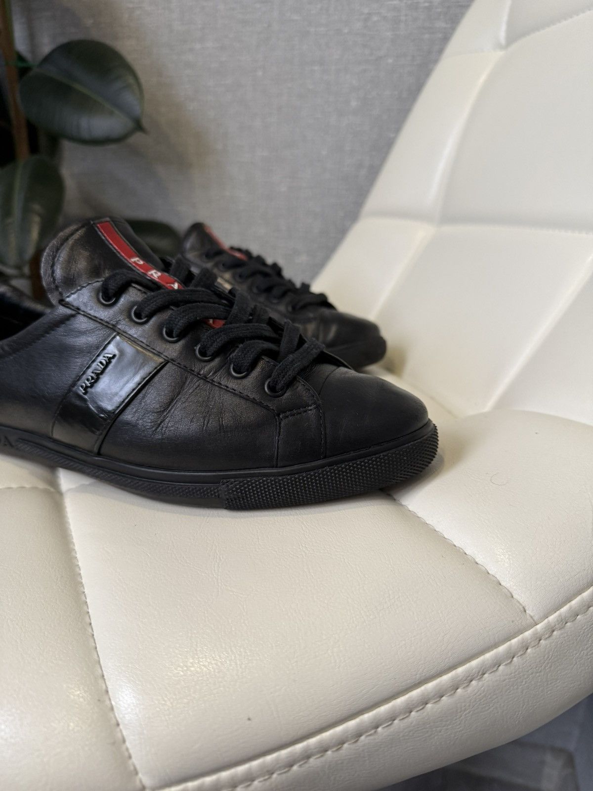 Prada Prada Black Leather Low-Top Sneakers with Red Stripe Logo Size US 7 / IT 37 - 10 Thumbnail