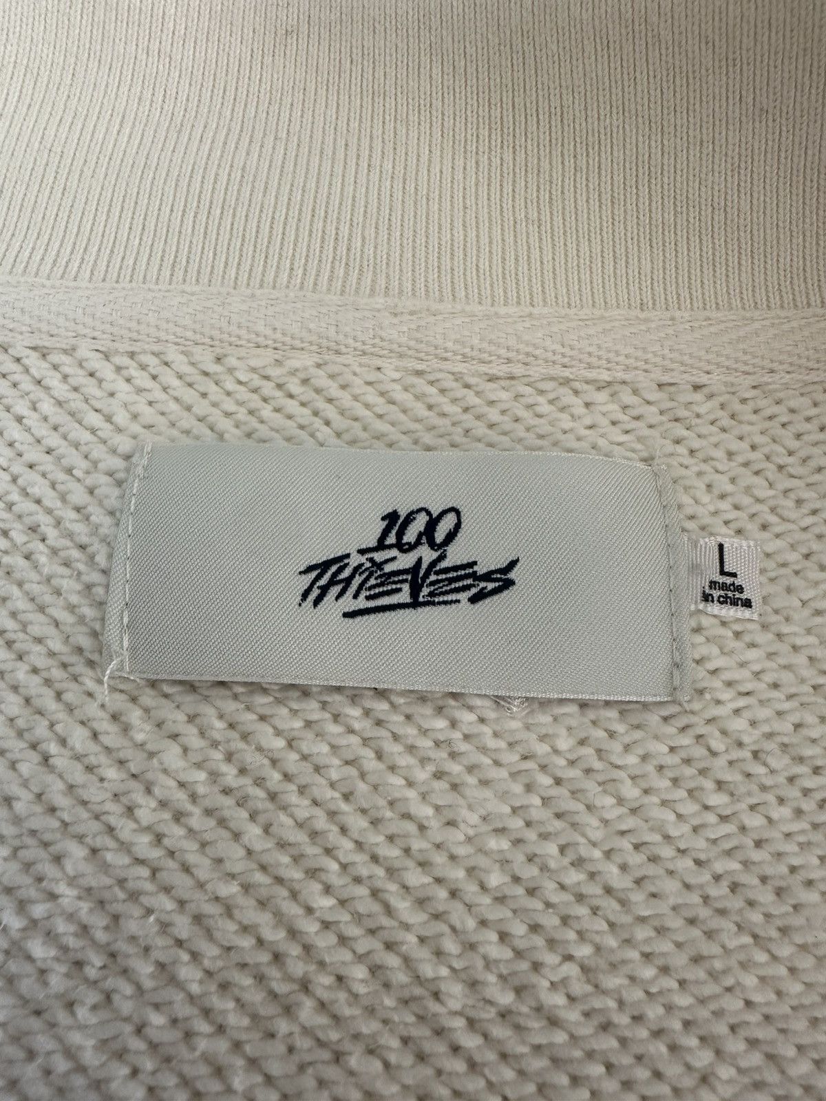 100 Thieves 100 Thieves Quarter Zip — Cream w/ Maroon Logo (L) Size US L / EU 52-54 / 3 - 6 Thumbnail