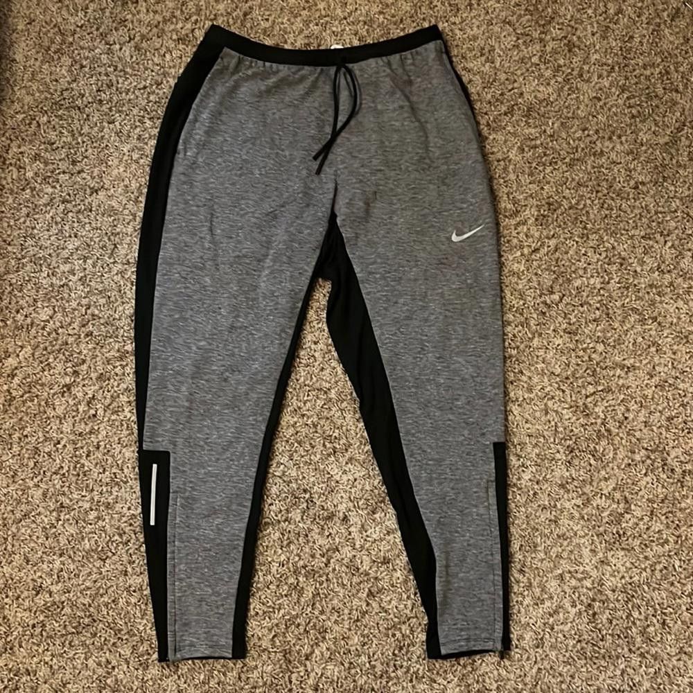 image of Nike Men's Therma Fit Run Division Phenom Elite Running Pants Samples in Black (Size 32)