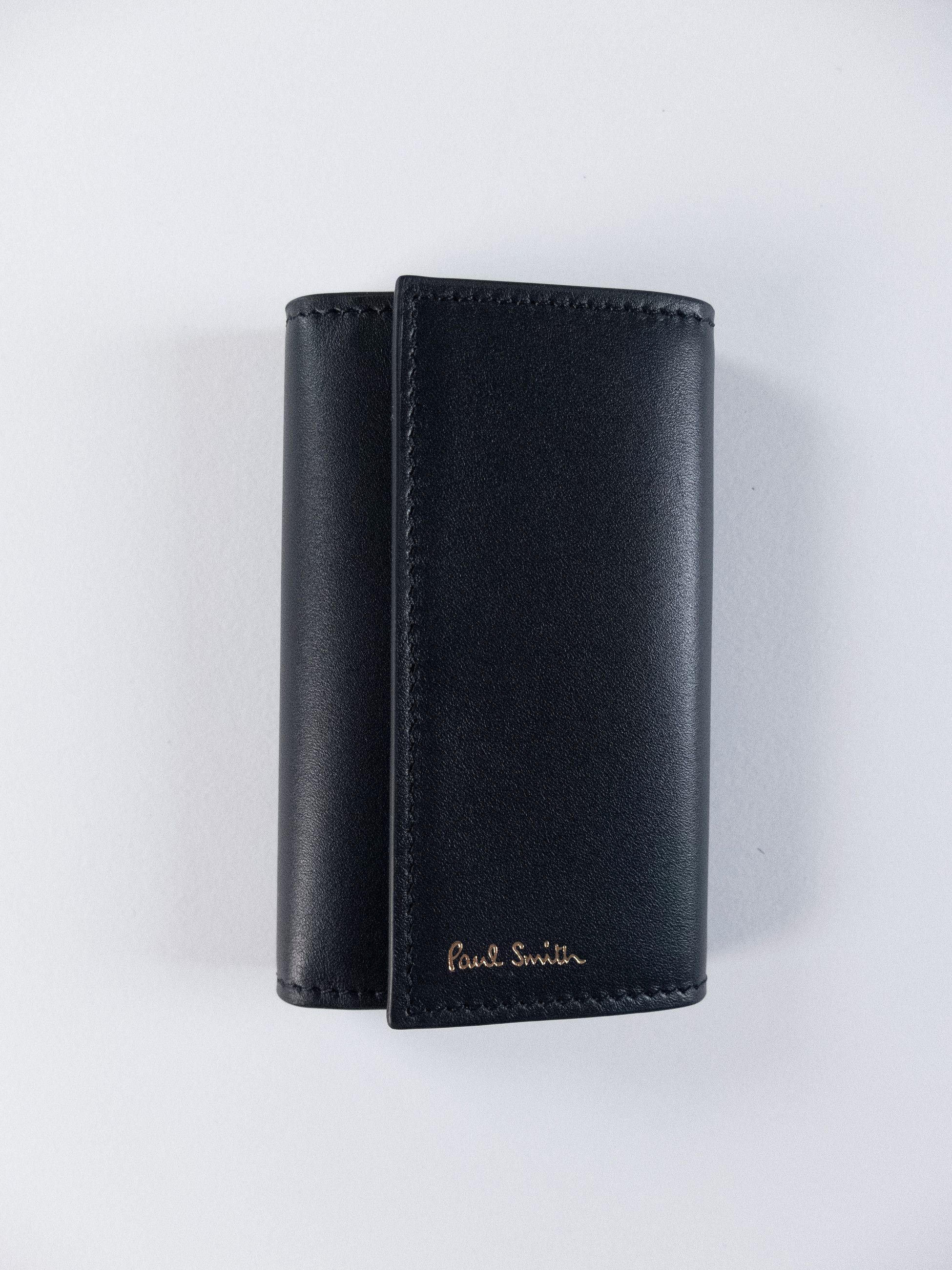 PAUL SMITH black leather key holder with stripe interior