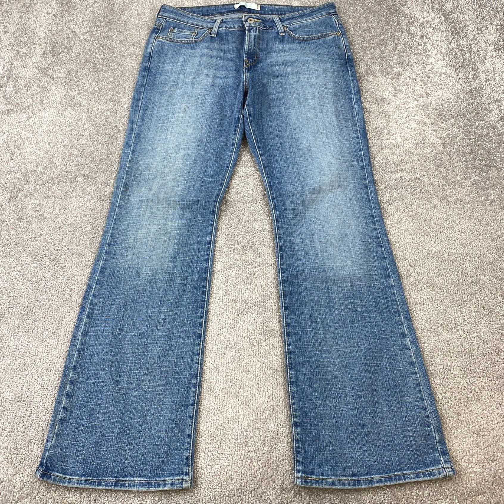 Levi s Authentic Women s Medium Blue Stone Wash 5 Pocket Low Bootcut Jeans Levi s 545 Boot Cut Fashion Pants Size 12 Grailed