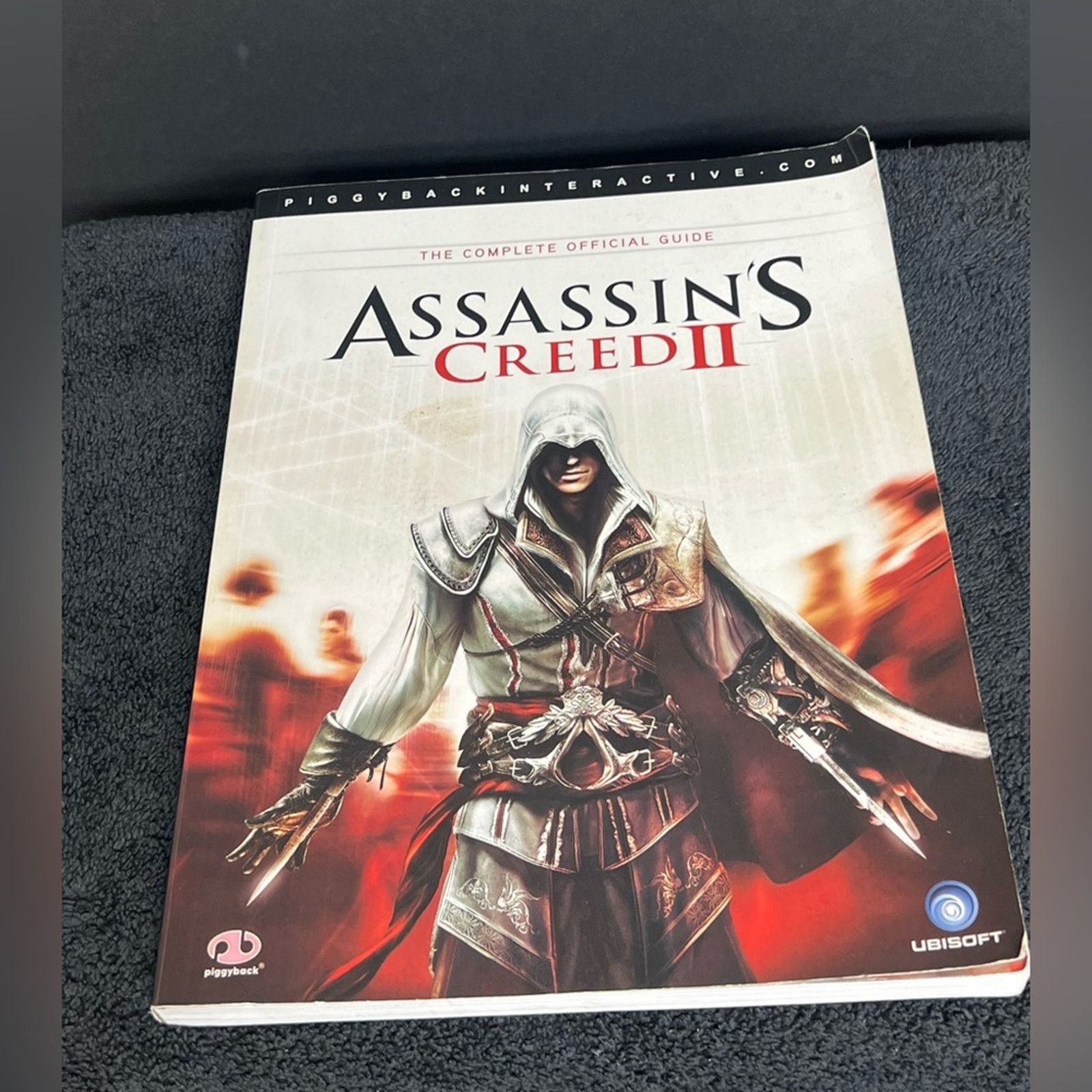 Sony Assassin's Creed II/2 Official Strategy Guide by Piggyback Size ONE SIZE - 1 Thumbnail