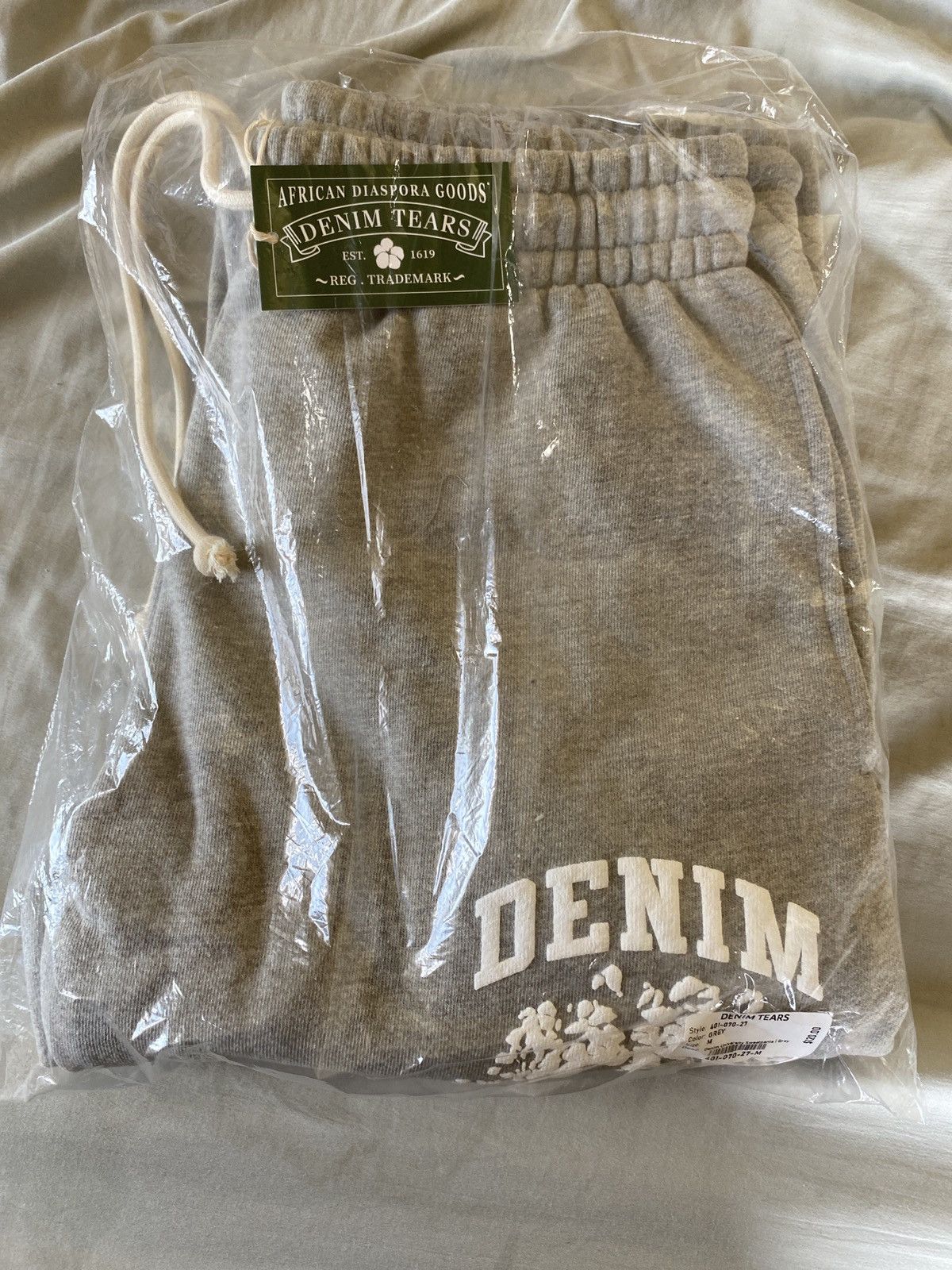 image of Denim Tears Cotton Wreath Logo Spellout in Grey, Men's (Size 43)