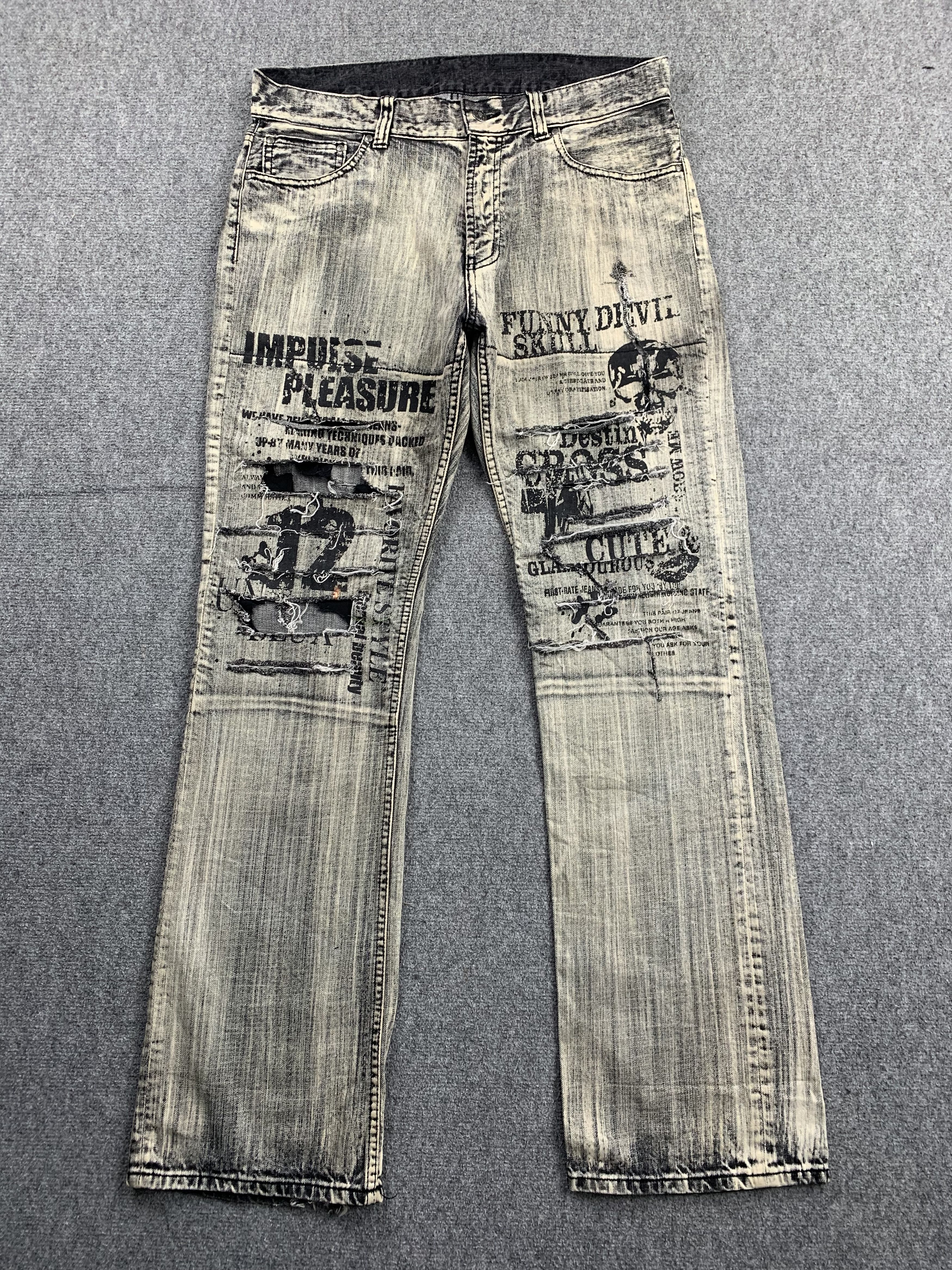 image of Vintage Distressed Japanese Skull Flared Faded Black Jeans, Men's (Size 34)