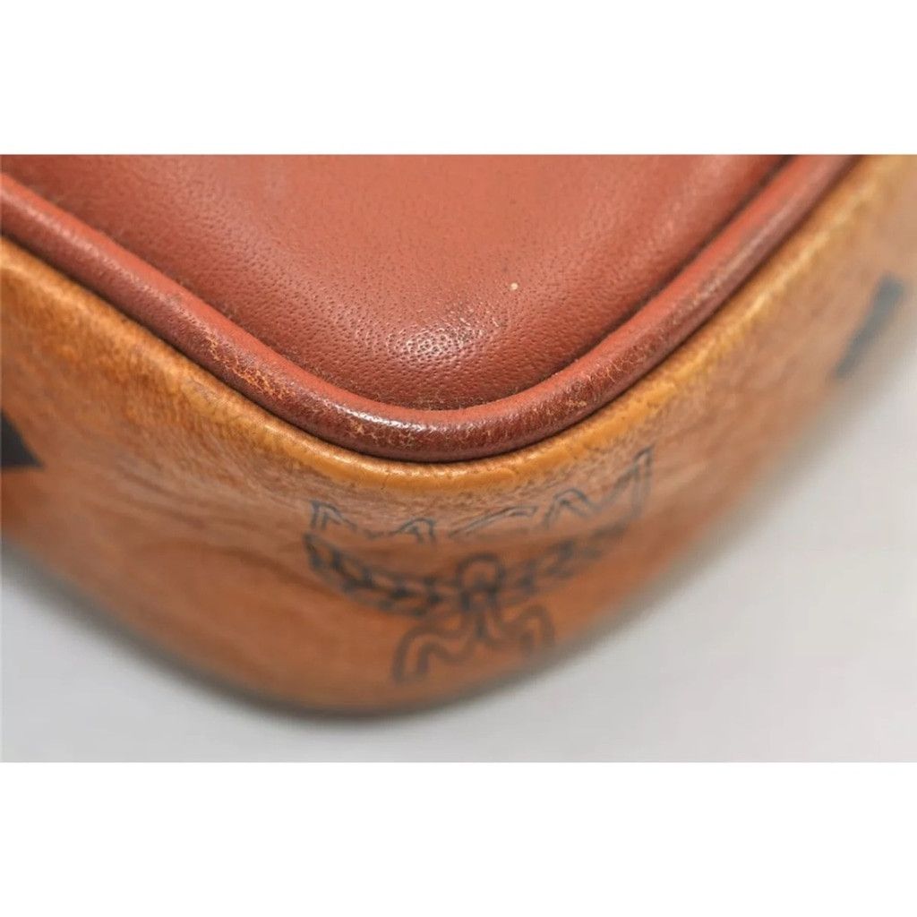 MCM MCM Brown Clutch with Logo Pattern and Wrist Strap Size ONE SIZE - 11 Thumbnail