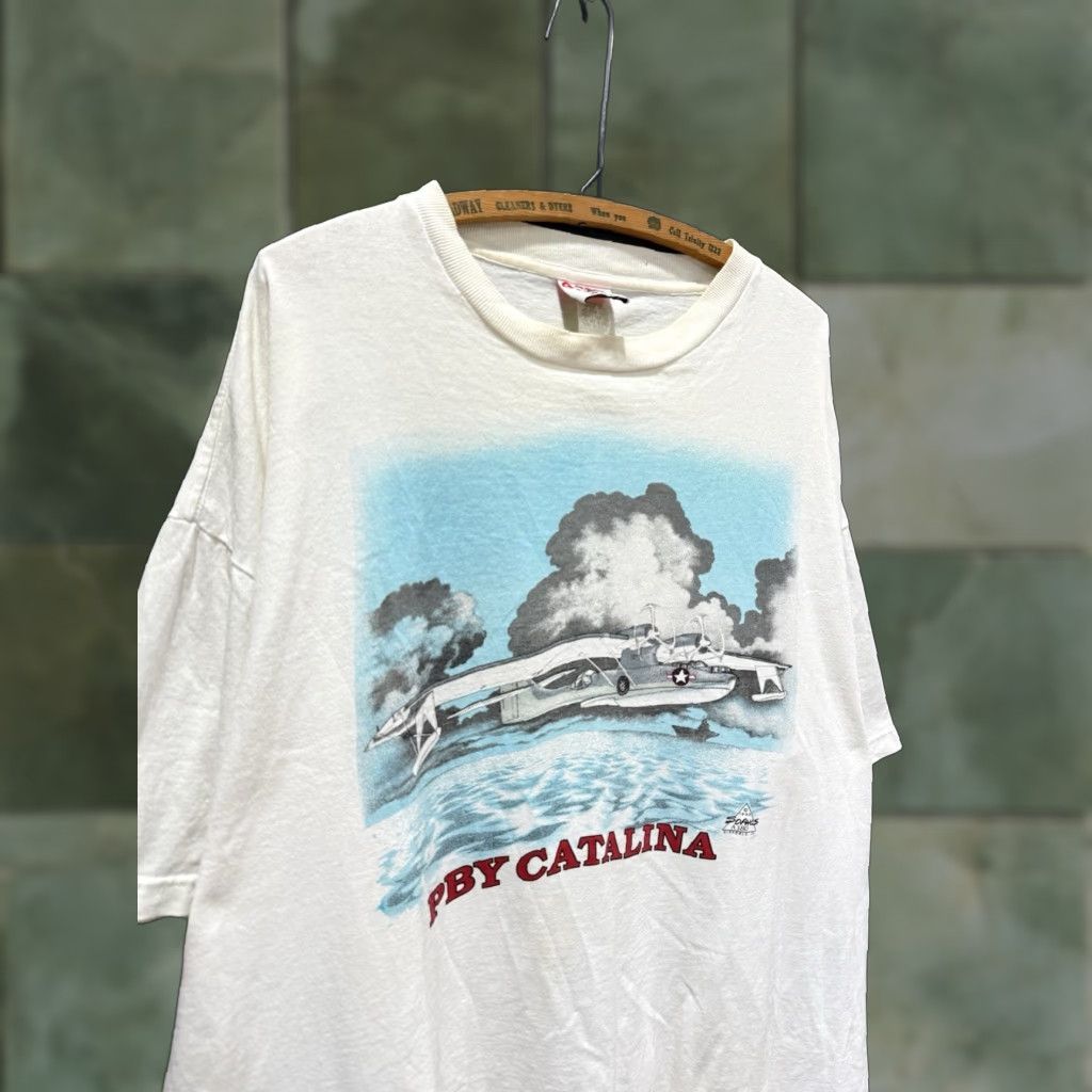 Catalina VINTAGE 90s PBY Catalina World War 2 Navy Plane White Tee Shirt 2XL T-Shirt Mens White 90s Planes Size US XXL / EU 58 / 5 - 1 Thumbnail